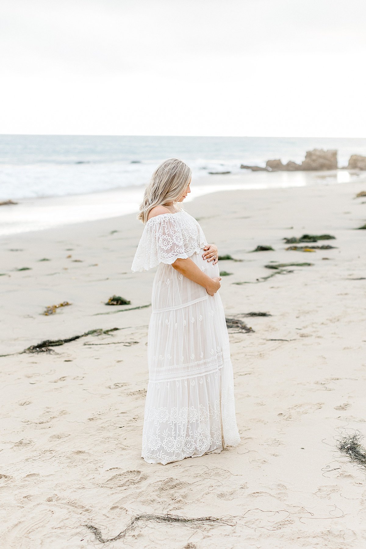 Newport Beach outdoor maternity portrait session candid with Ambre Williams Photograhy