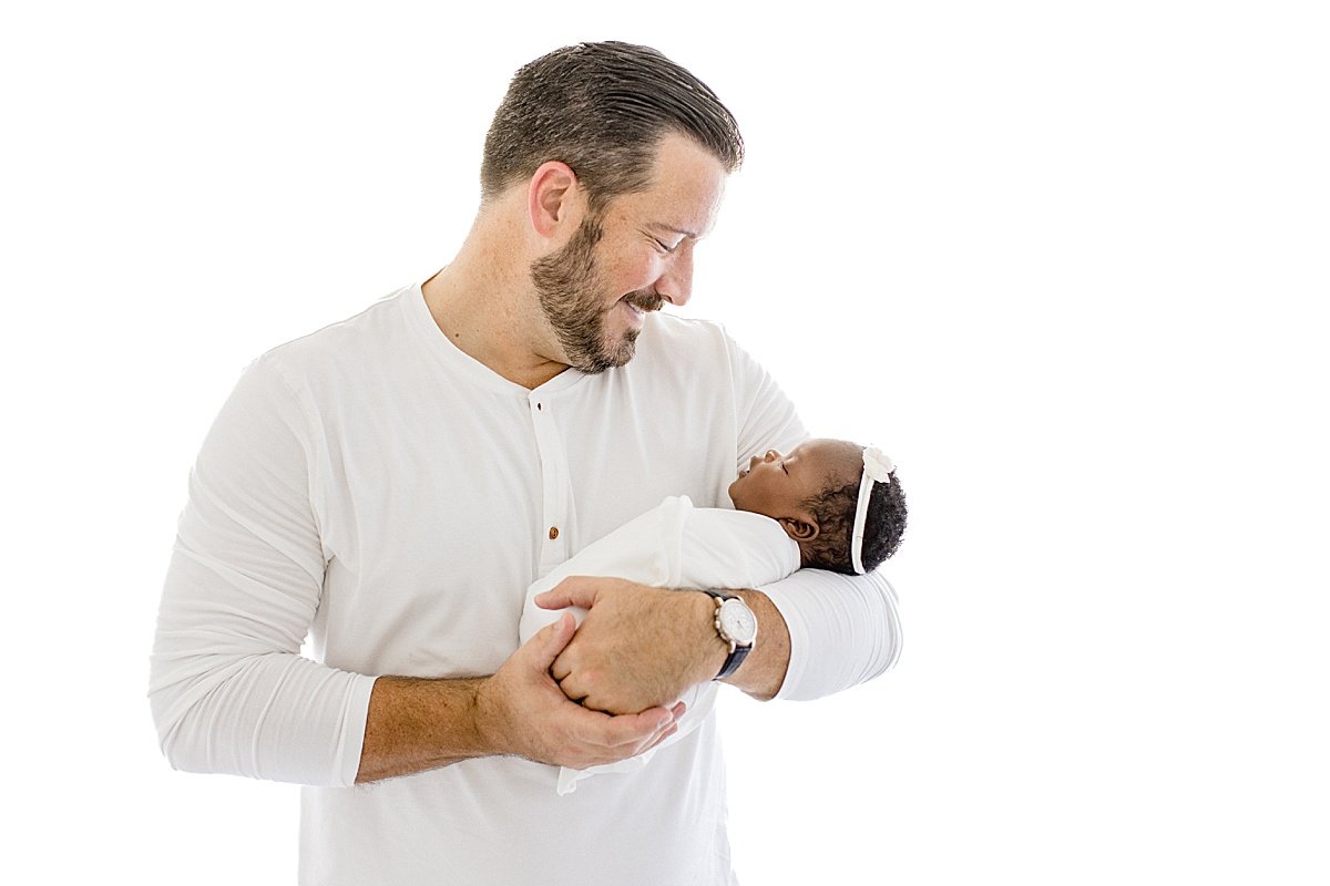 Candid Portrait of Dad and Baby daughter | Ambre Williams Photography in Newport Beach