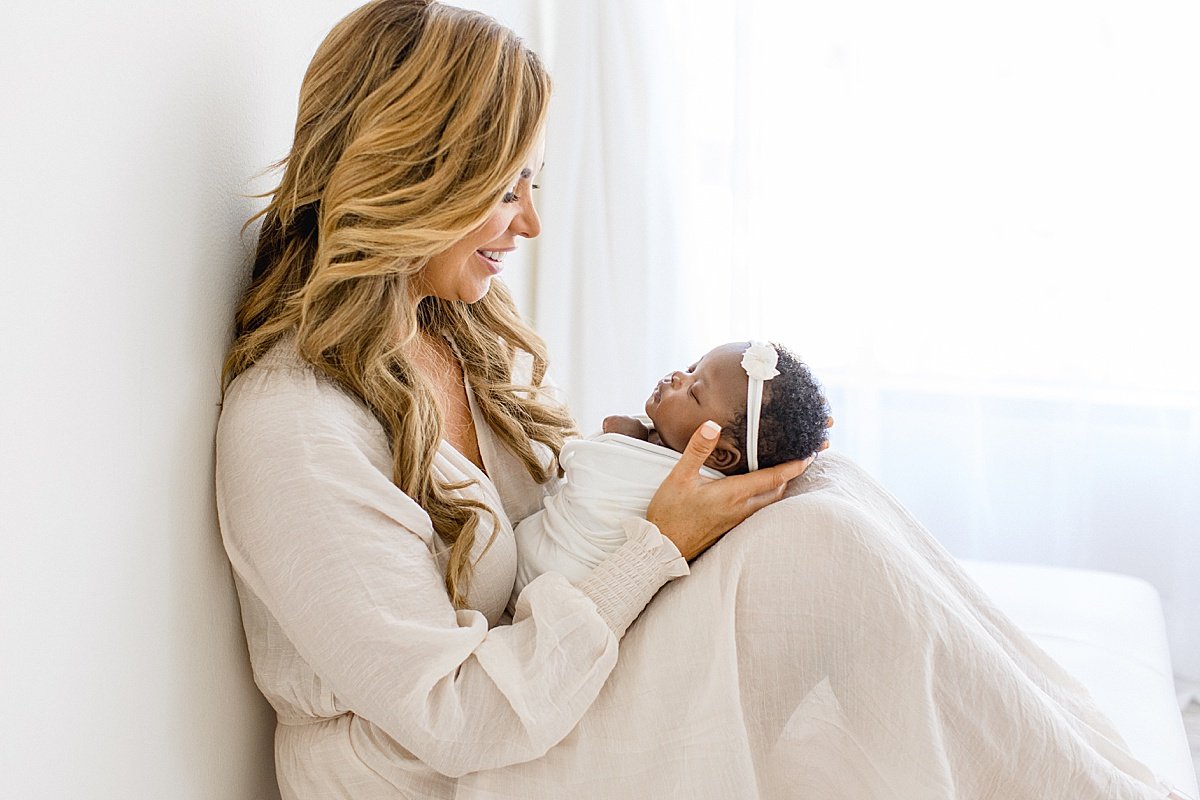 Beautiful Mom and Baby snuggles during Newport Beach Newborn Session | Ambre Williams Photography Studio