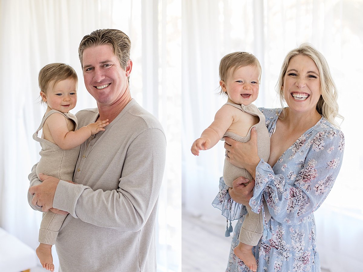 Mom and Dad holding their son during First Birthday Milestone photography Session | Ambre Williams Photography 