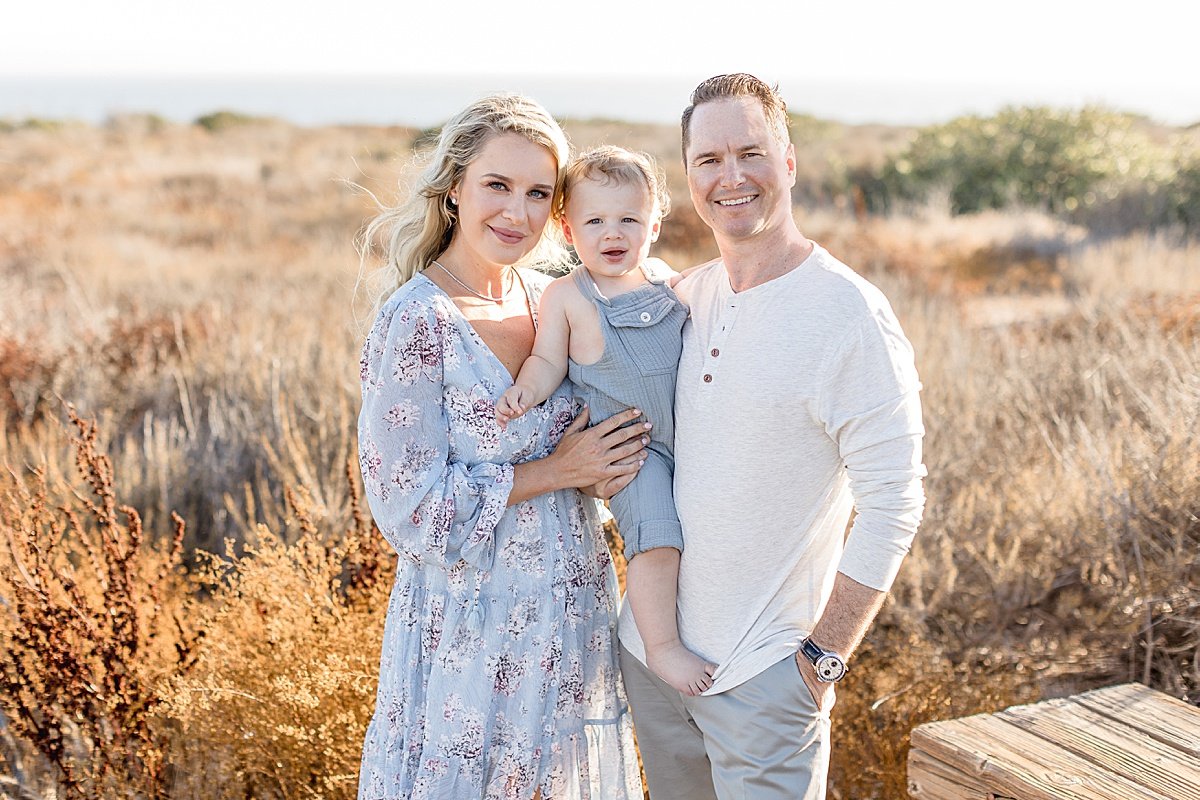 Family Sunset Beach Portraits at boardwalk with Ambre Williams Photography in Newport Beach