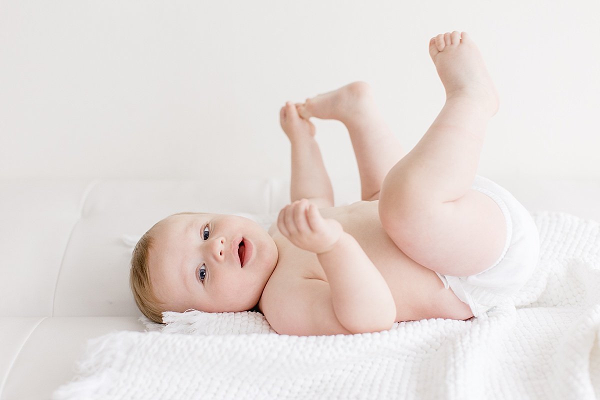 Happy Baby candid portrait during studio session with Ambre Williams Photography in Newport Beach CA