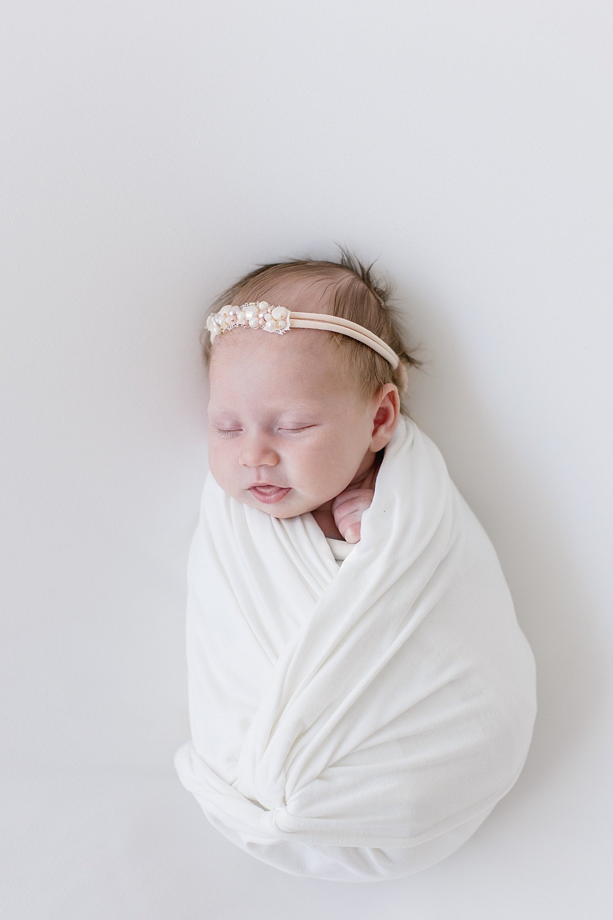 Newborn Baby girl sleeping during studio session | Ambre Williams Photography in Newport Beach CA