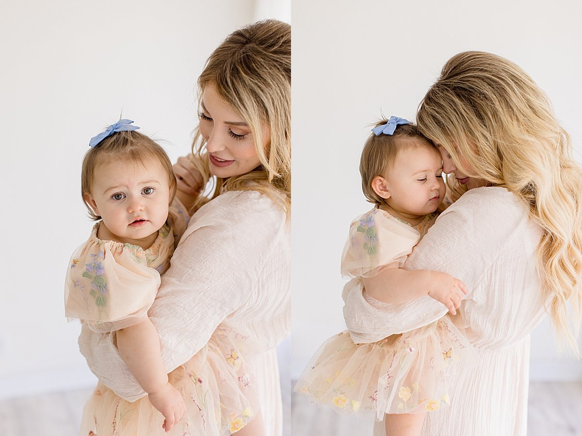 Mom snuggling baby daughter with Ambre Williams Photography in Newport Beach Studio session