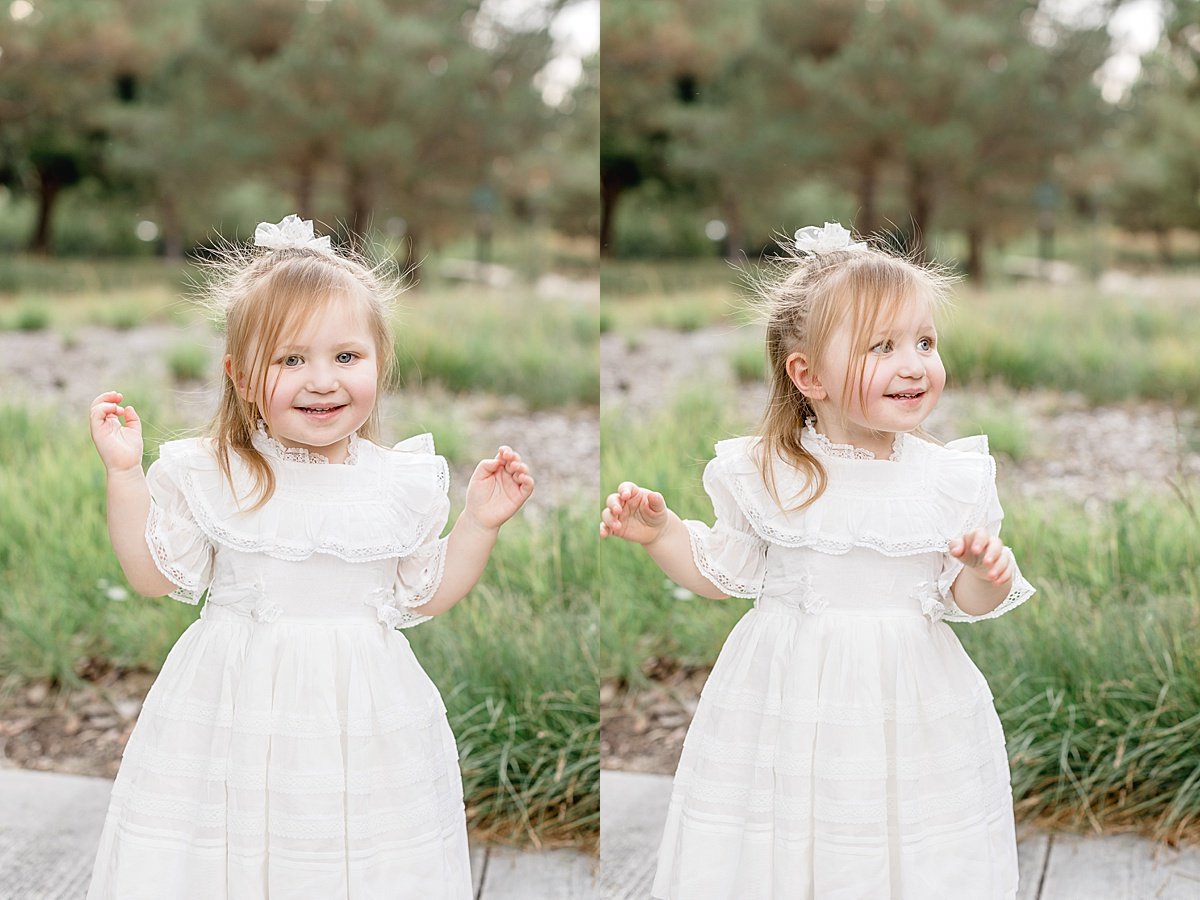 Daughter dancing during outdoor portrait session for fall family photoshoot with Ambre Williams Photography
