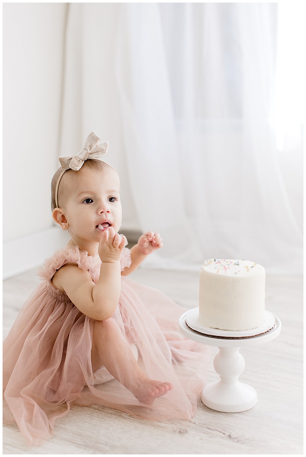 in studio first year cake smash session with Ambre Williams Photography