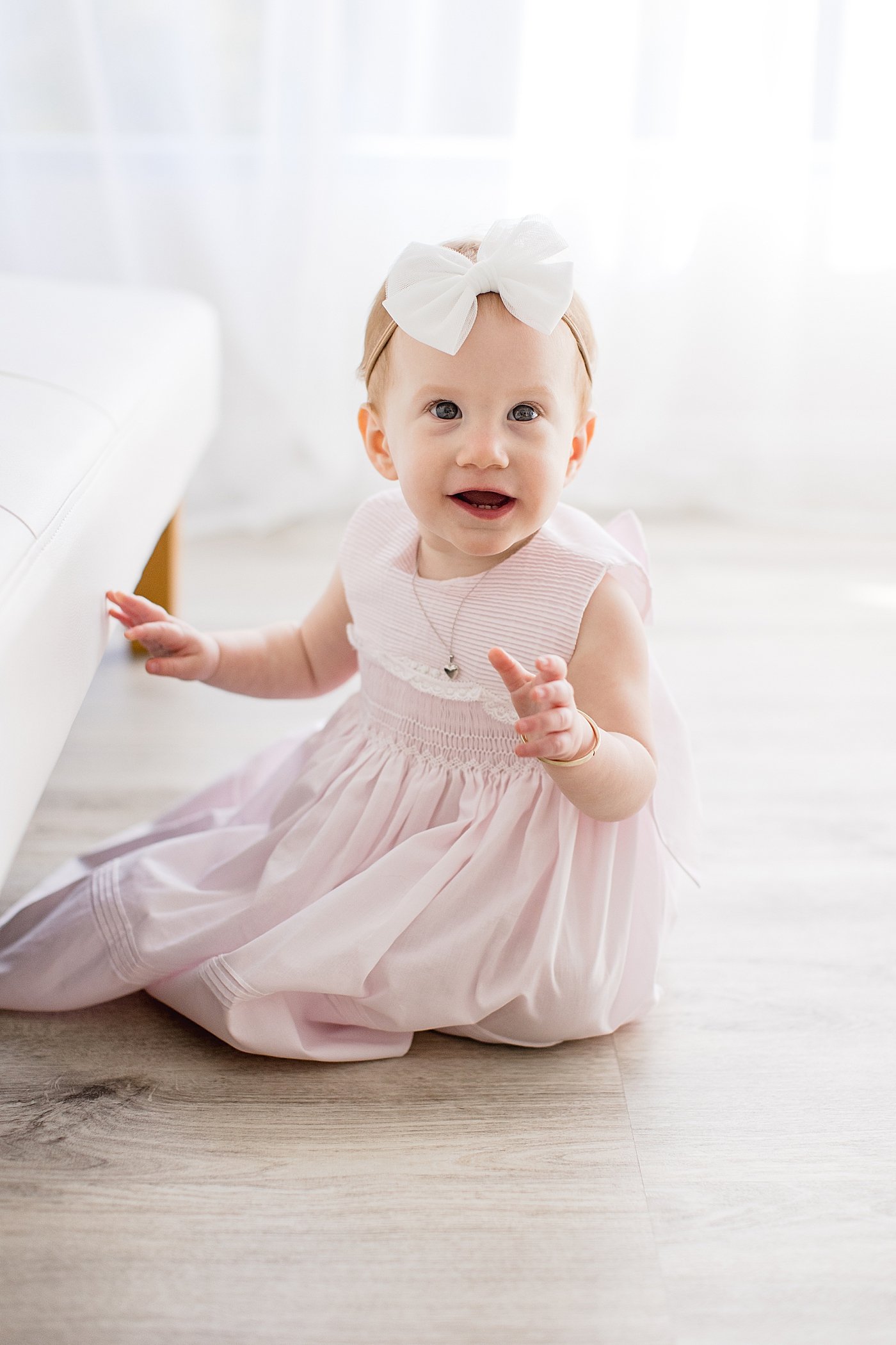 One year old in pink dress | Ambre Williams Photography