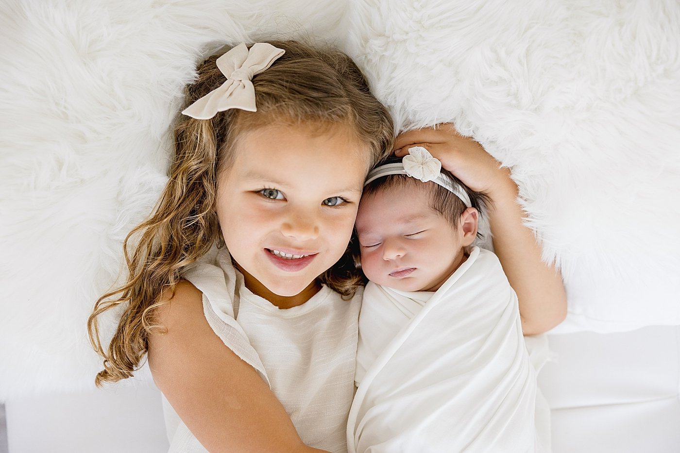 Big Sister with Baby Girl in Newborn Session | Ambre Williams Photography