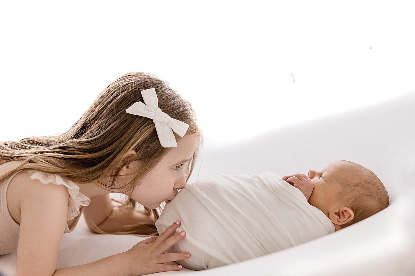 Big Sister with Newborn in Studio with Ambre Williams Photography