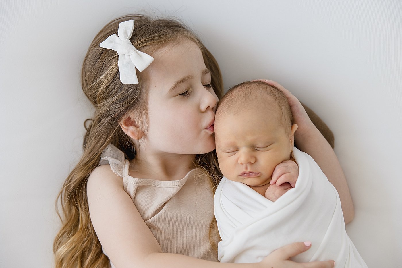 Siblings in Newport Beach Studio with Ambre Williams Photography