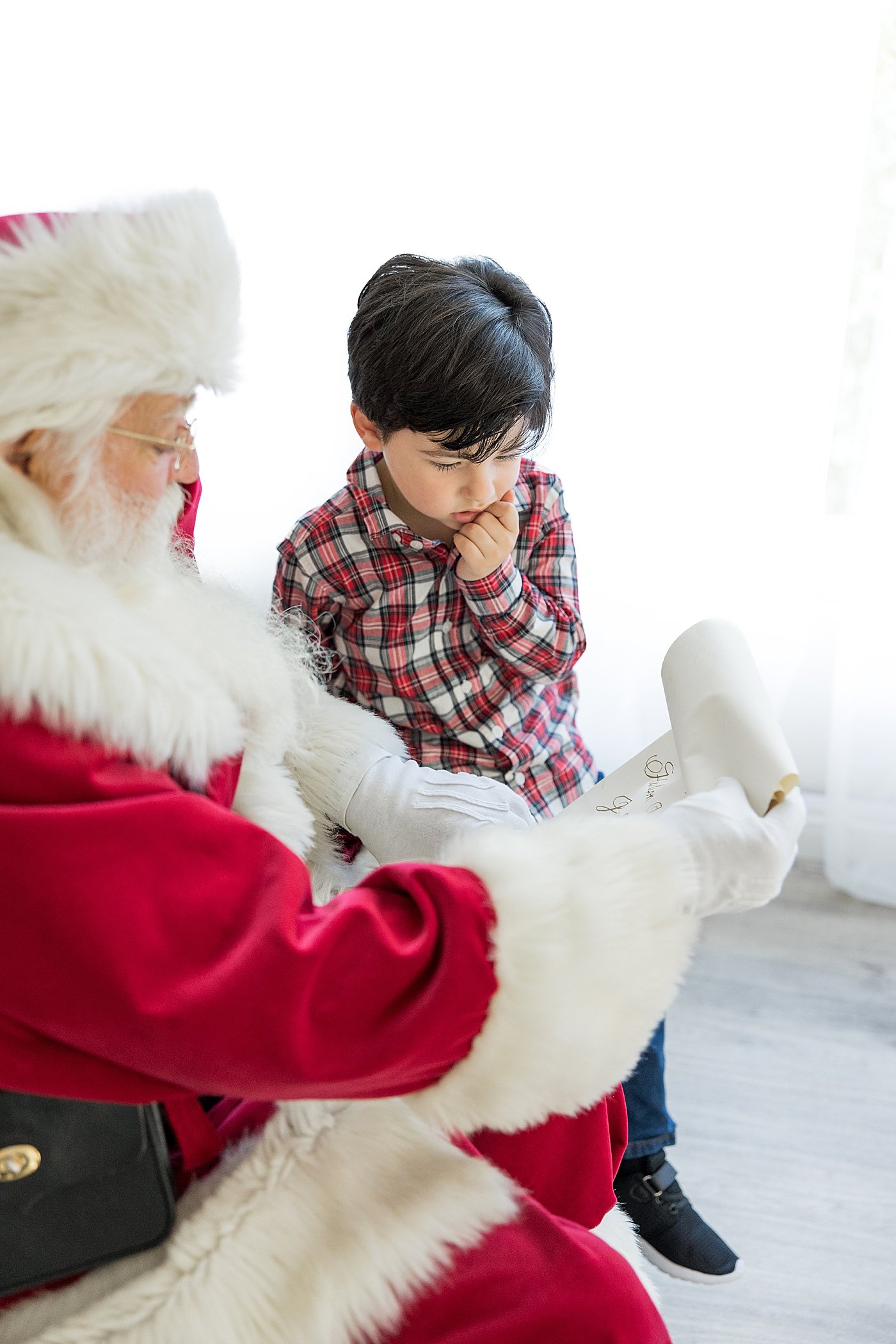 Santa Checks The Nice List In Studio With Ambre Williams Photography