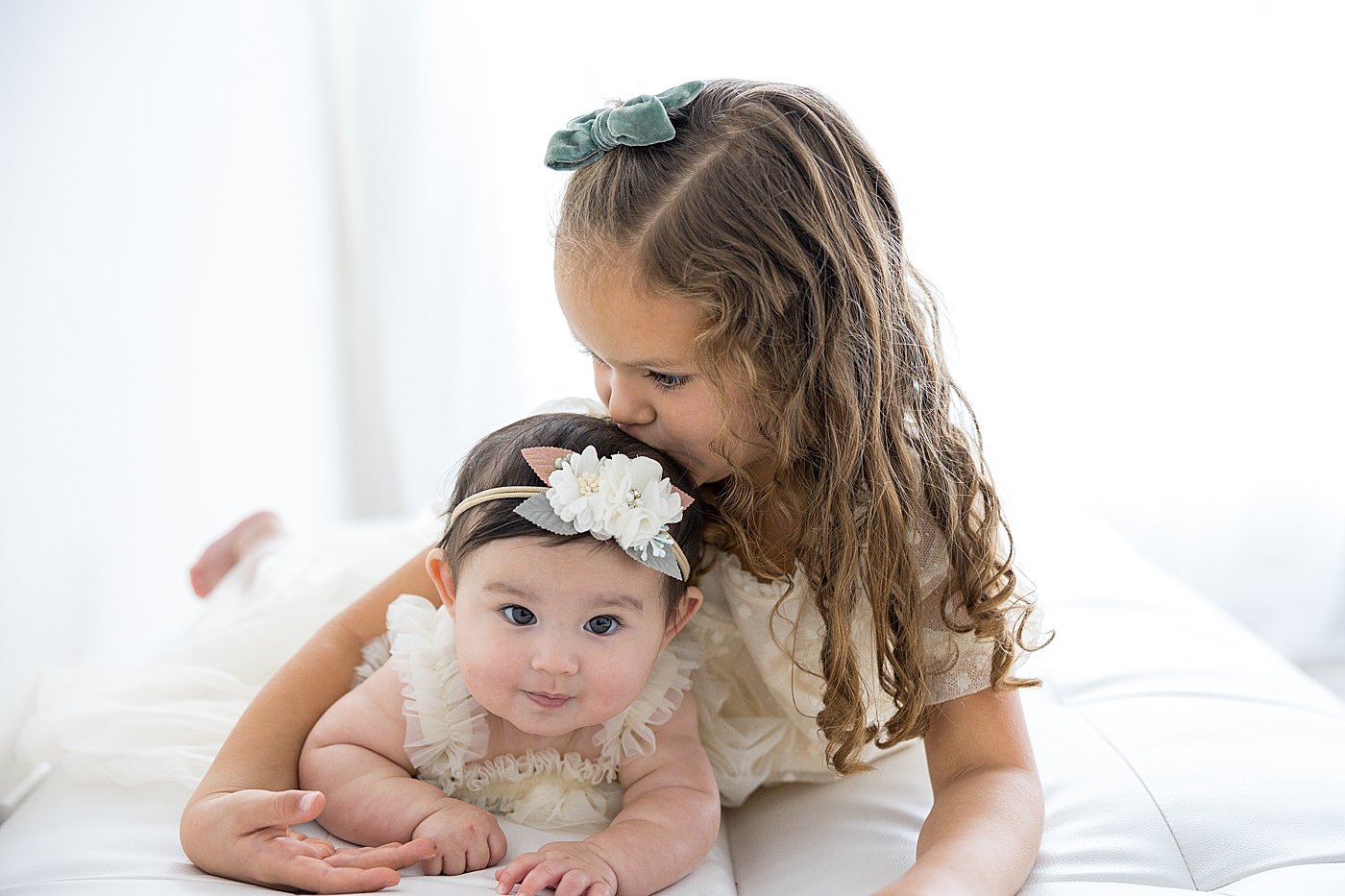 Big Sister with Baby Girl Milestone Session | Ambre Williams Photography