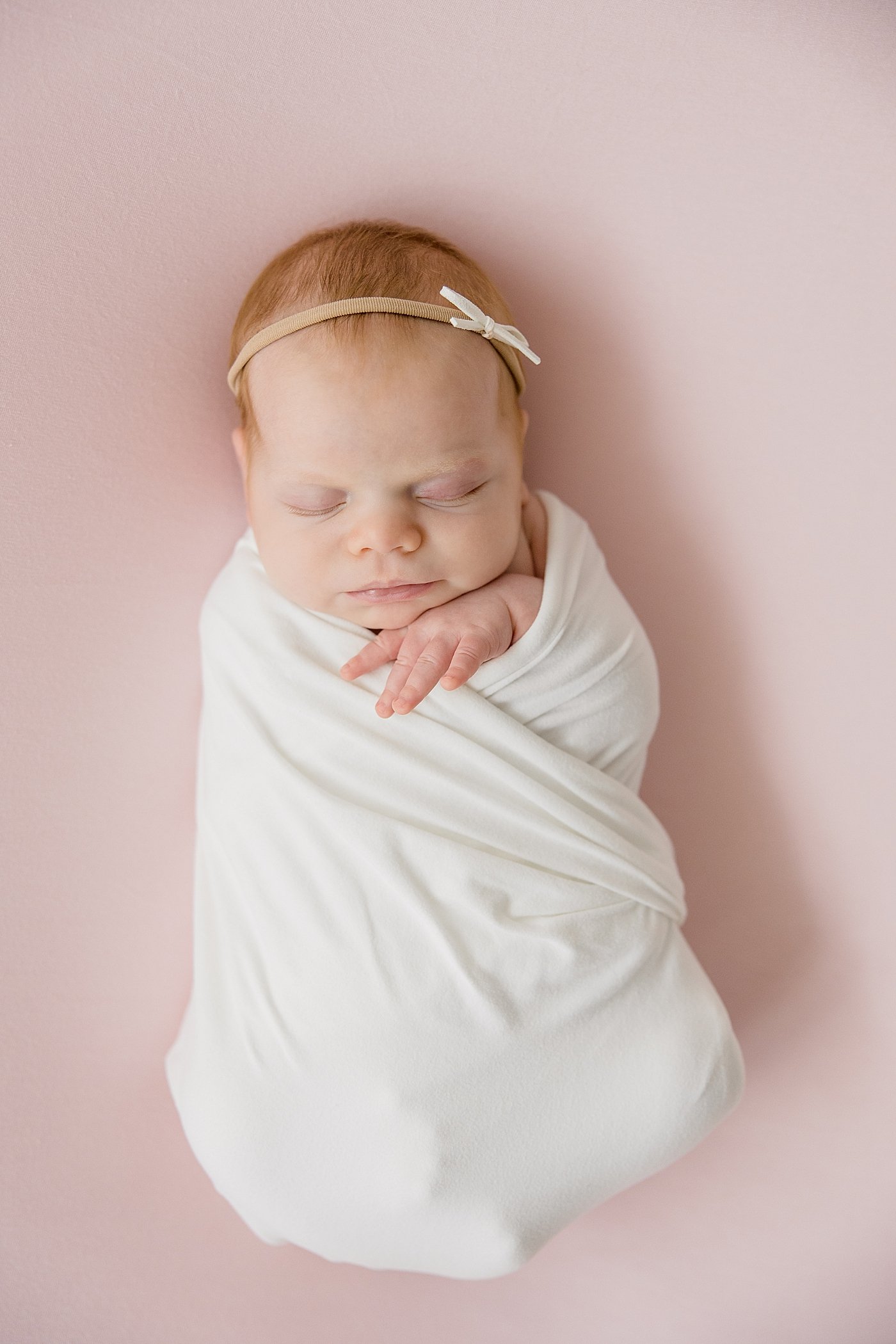 Newborn Portraits In Swaddle with Ambre Williams Photography