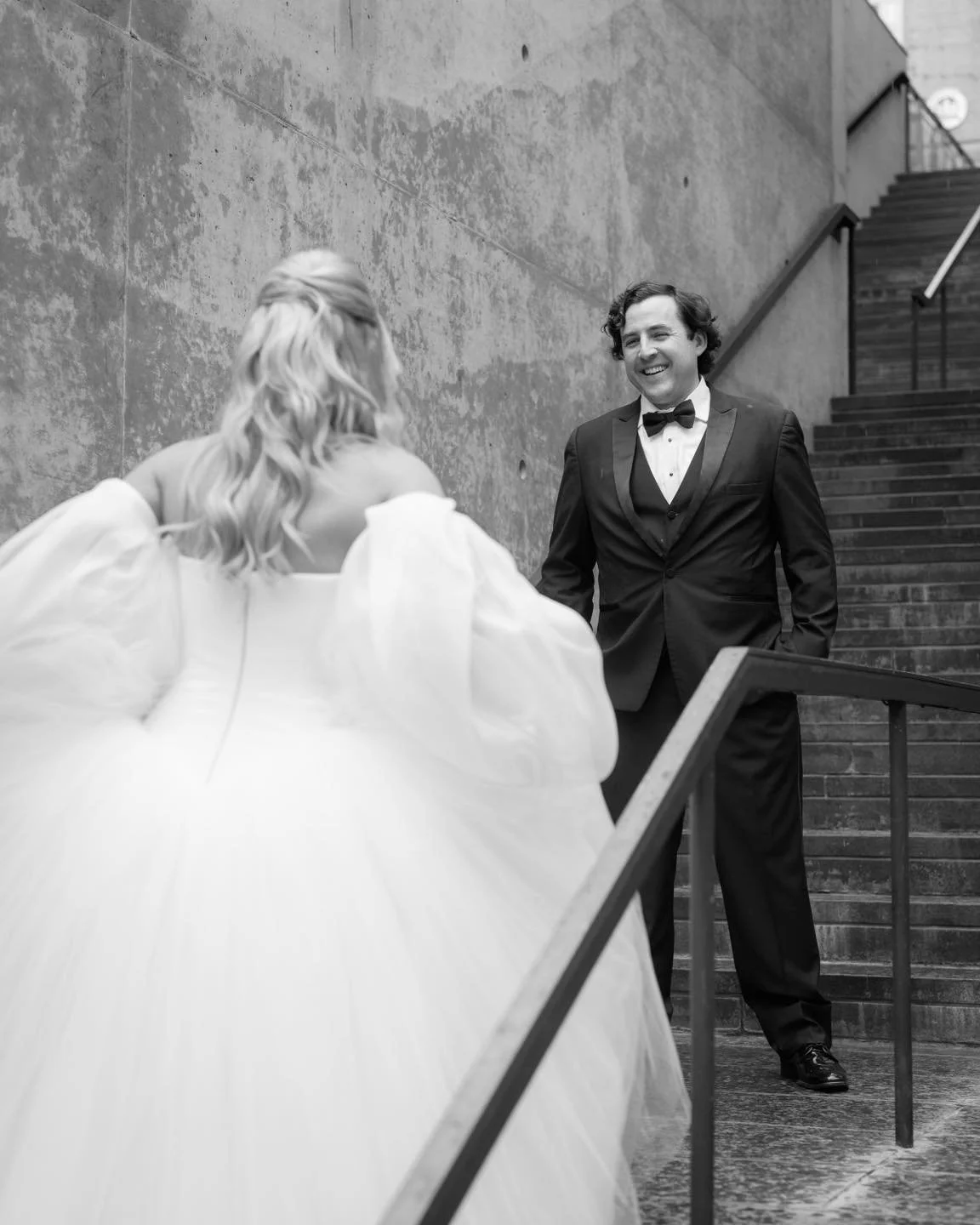 Peter + Peyton wanted their first look to happen on the steps of ACL Live, where they had their first date. The weather had other plans. Moments after they embraced, the skies opened up unexpectedly and we had to run for cover! Her bridesmaids called