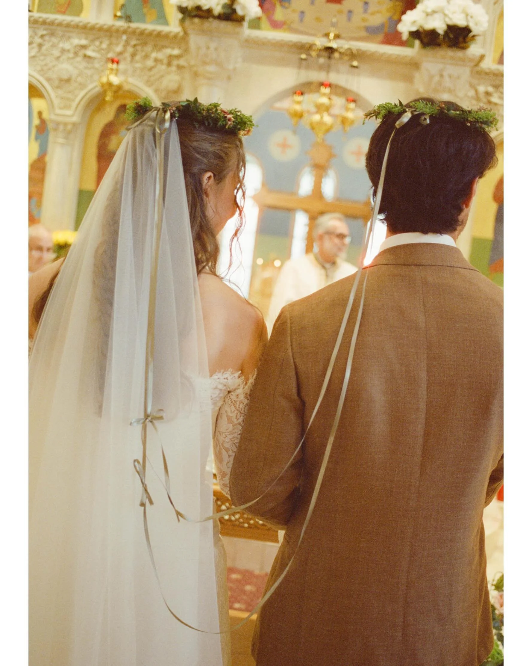 Ceci &amp; Stewart and their beautiful Greek wedding. I love the joining ribbon on their crowns, which represents the unbreakable bond between them. 💛