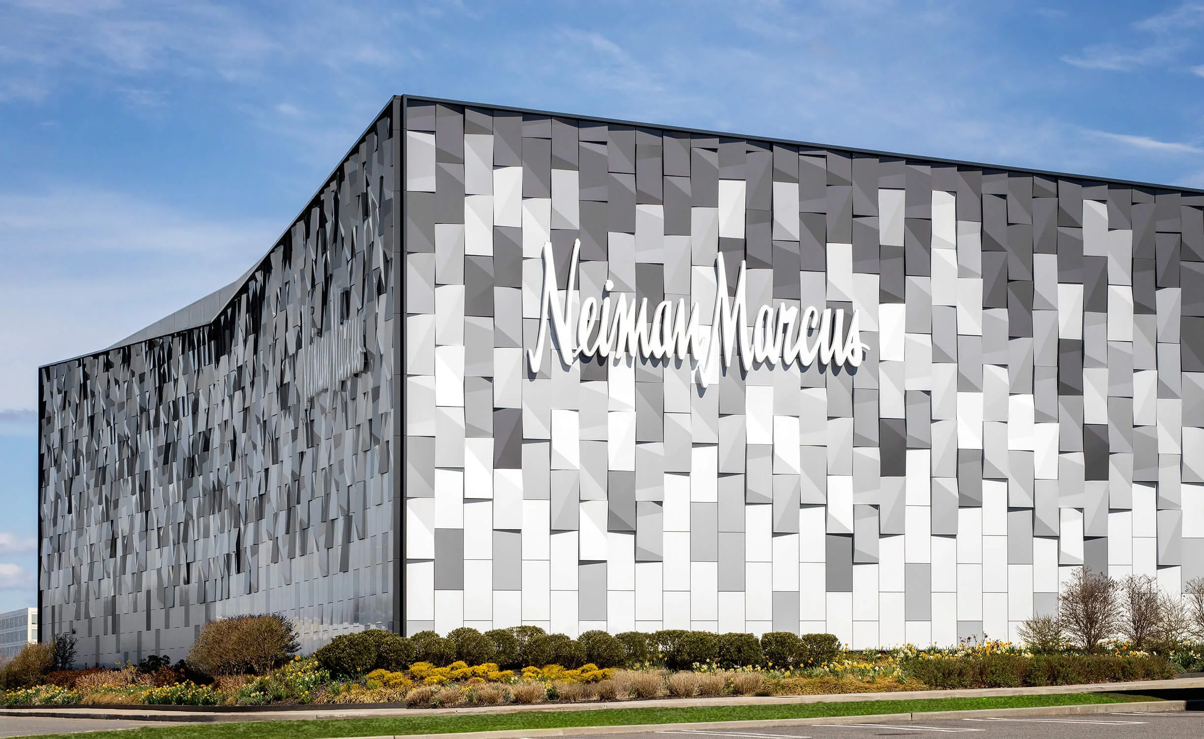 Neiman Marcus exterior with geometric aluminum facade and landscaping, commercial architectural photography by Brian Berkowitz Photography Long Island