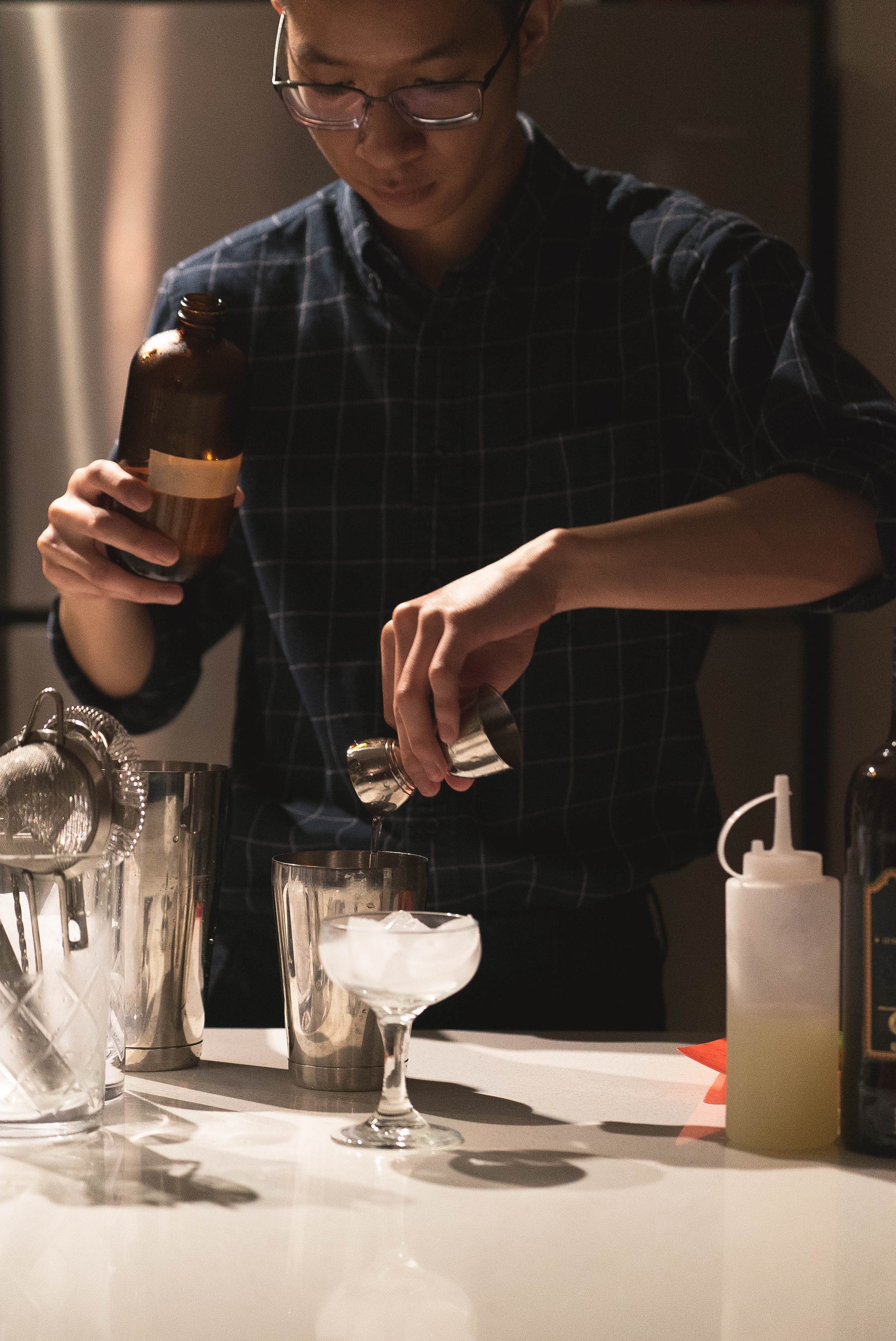 old fashioned dan making cocktail