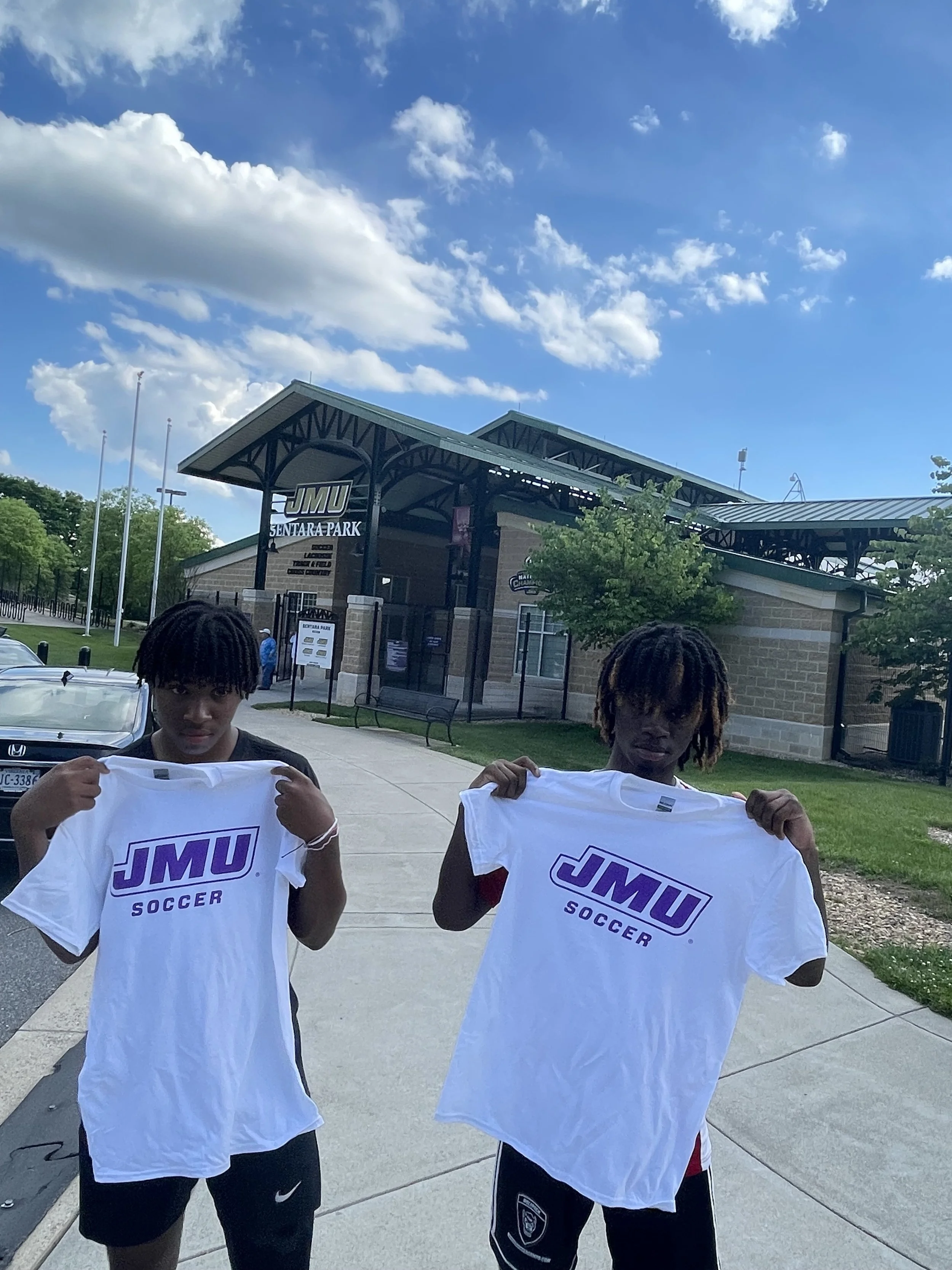 E with his friend Kaden on a visit to James Madison University