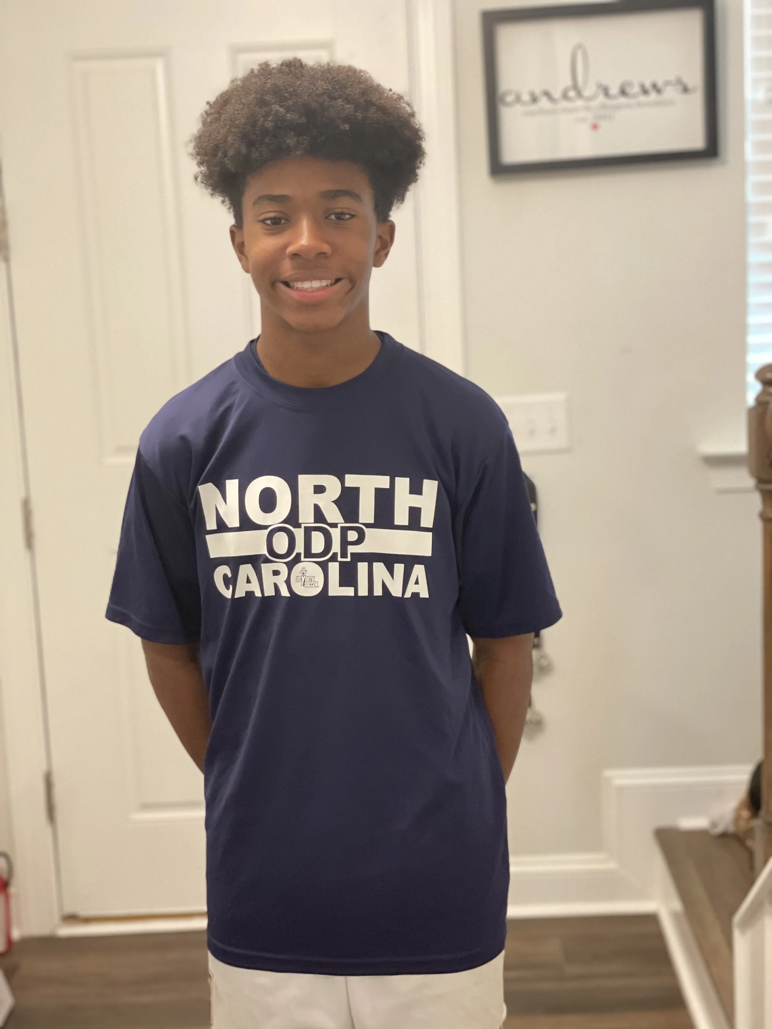 E representing NC Olympic Development Program
