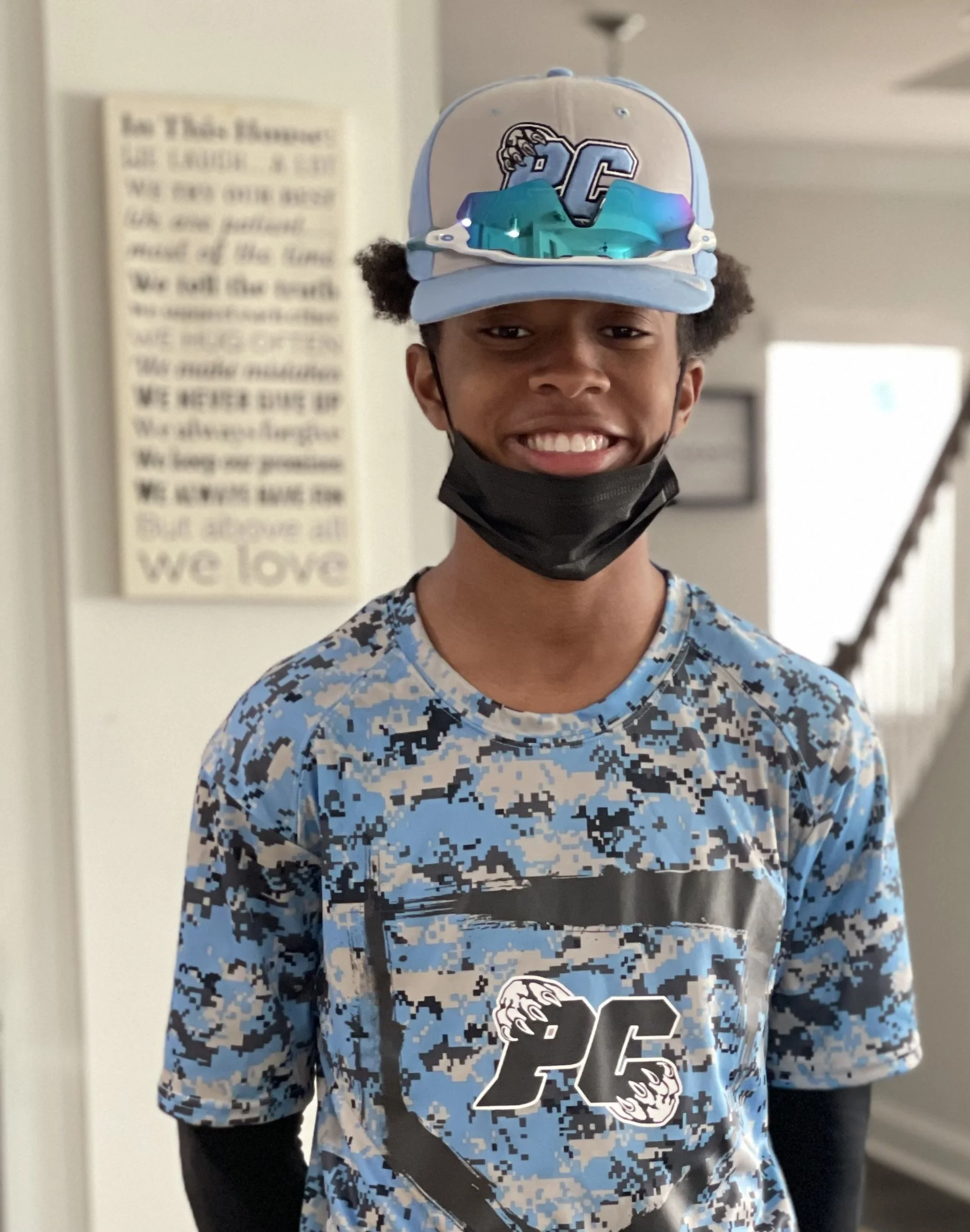 E w/ his high school baseball team