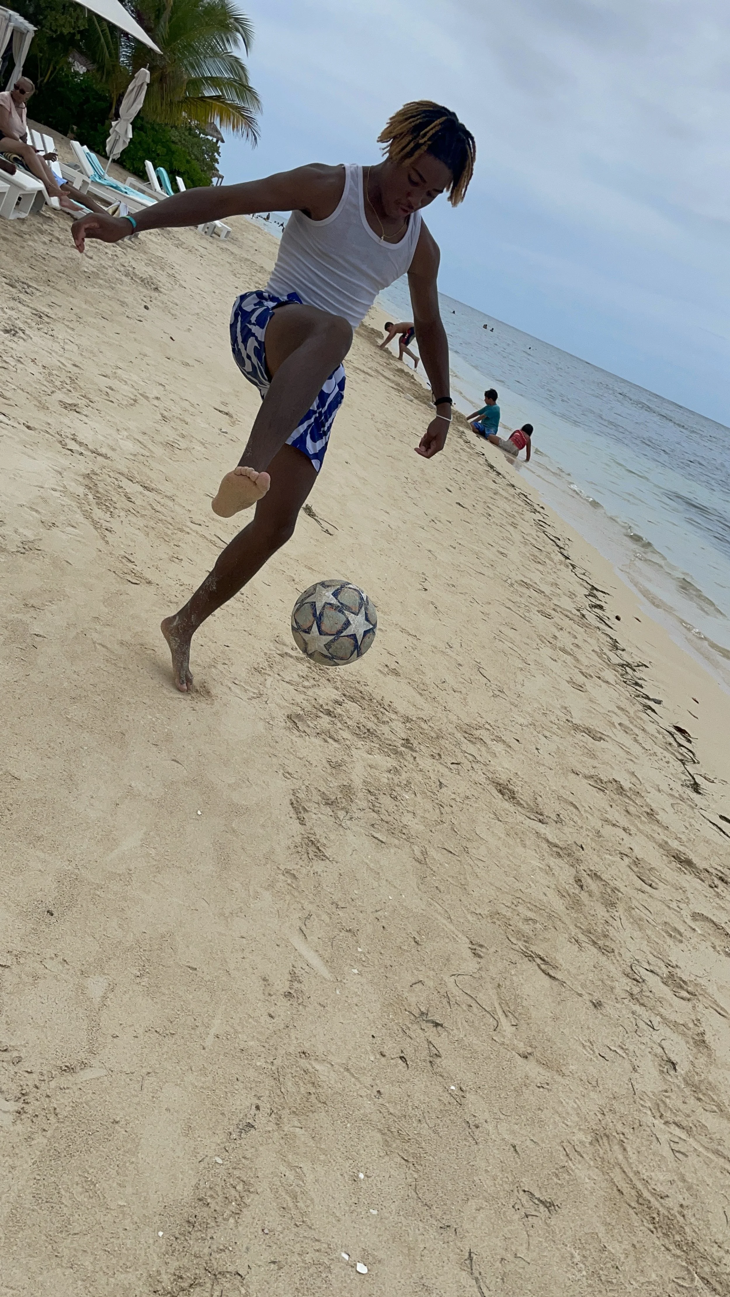 E on the beach in Jamaica. Always down for pick-up.
