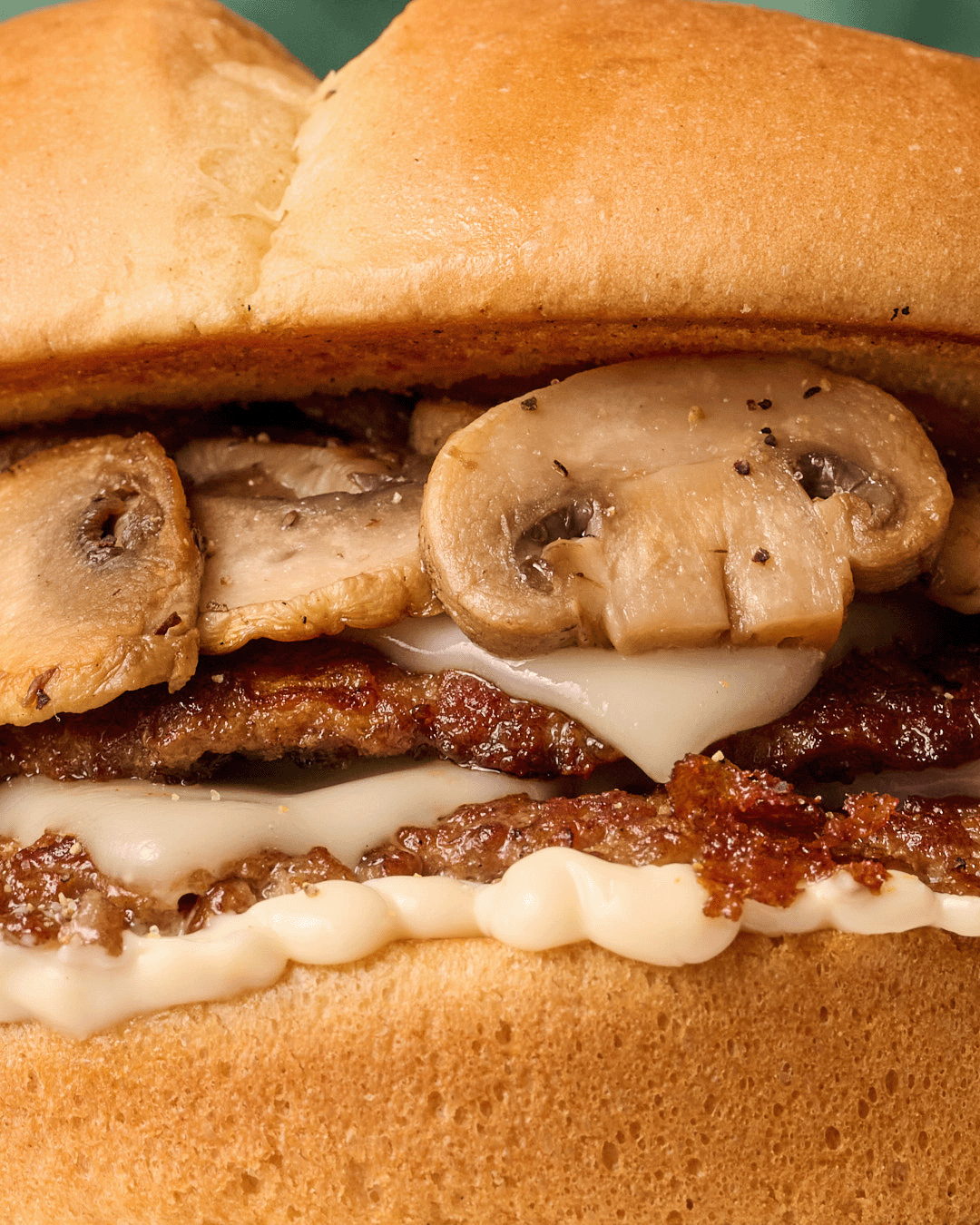gif-MUSHROOM-ONION-SWISS-SMASHED-BURGER.gif