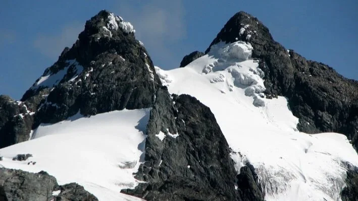 The Rwenzori Mountains are an extremely steep and rugged mountain range with over twenty-five peaks making it one of the most beautiful alpine areas in Africa.