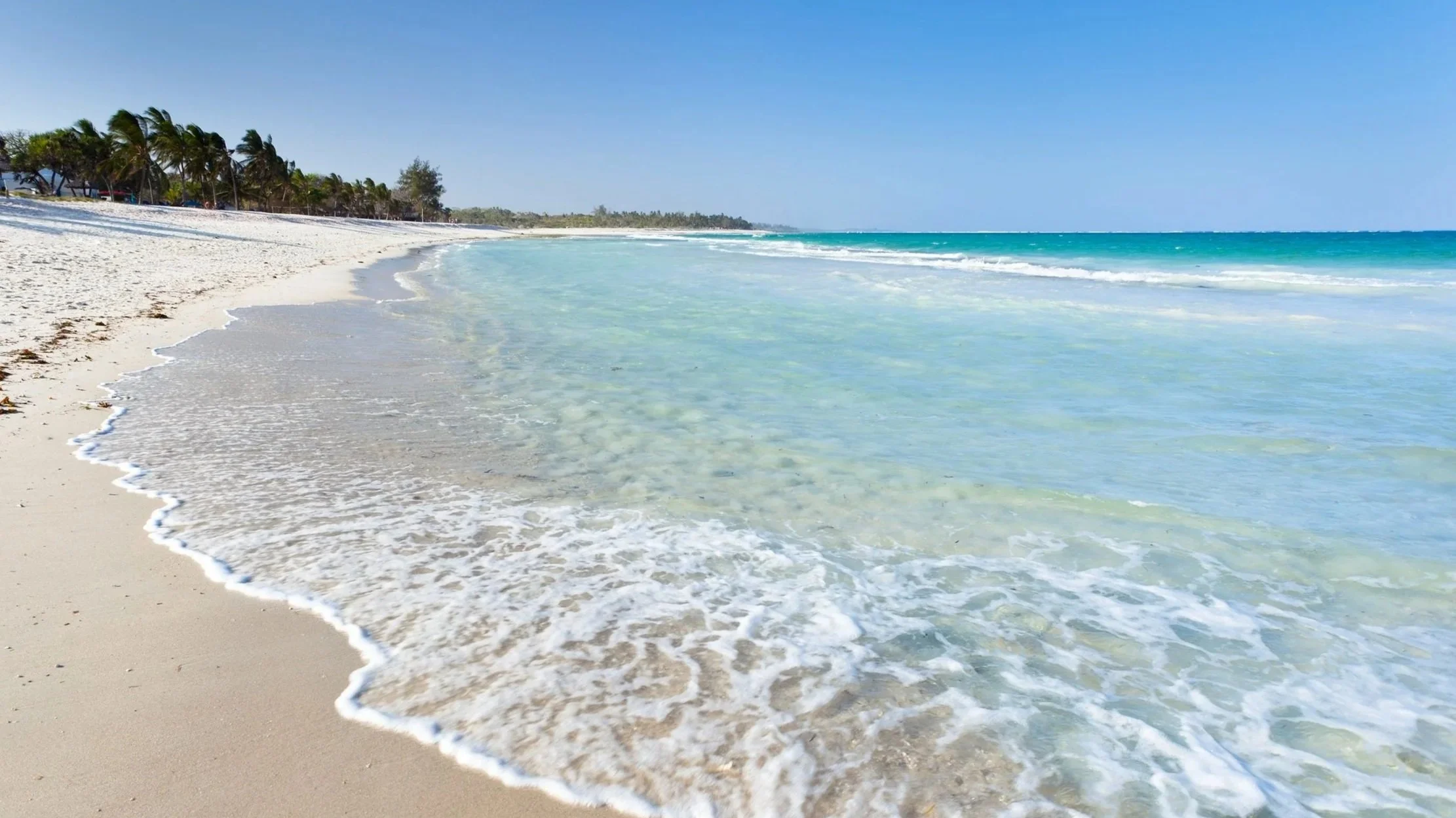 The Kenyan costs is a tropical paradise of palm-fringed white sand beaches, where the waters of the Indian Ocean meet beautiful coral reefs.