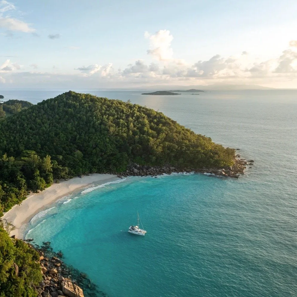 Your boots are dusty, your camera roll is full, and you are happily exhausted.

What comes next shouldn't just be another beach. It should be a complete sensory reset.

A short hop off the East African coast lands you here: 115 granite and coral isla