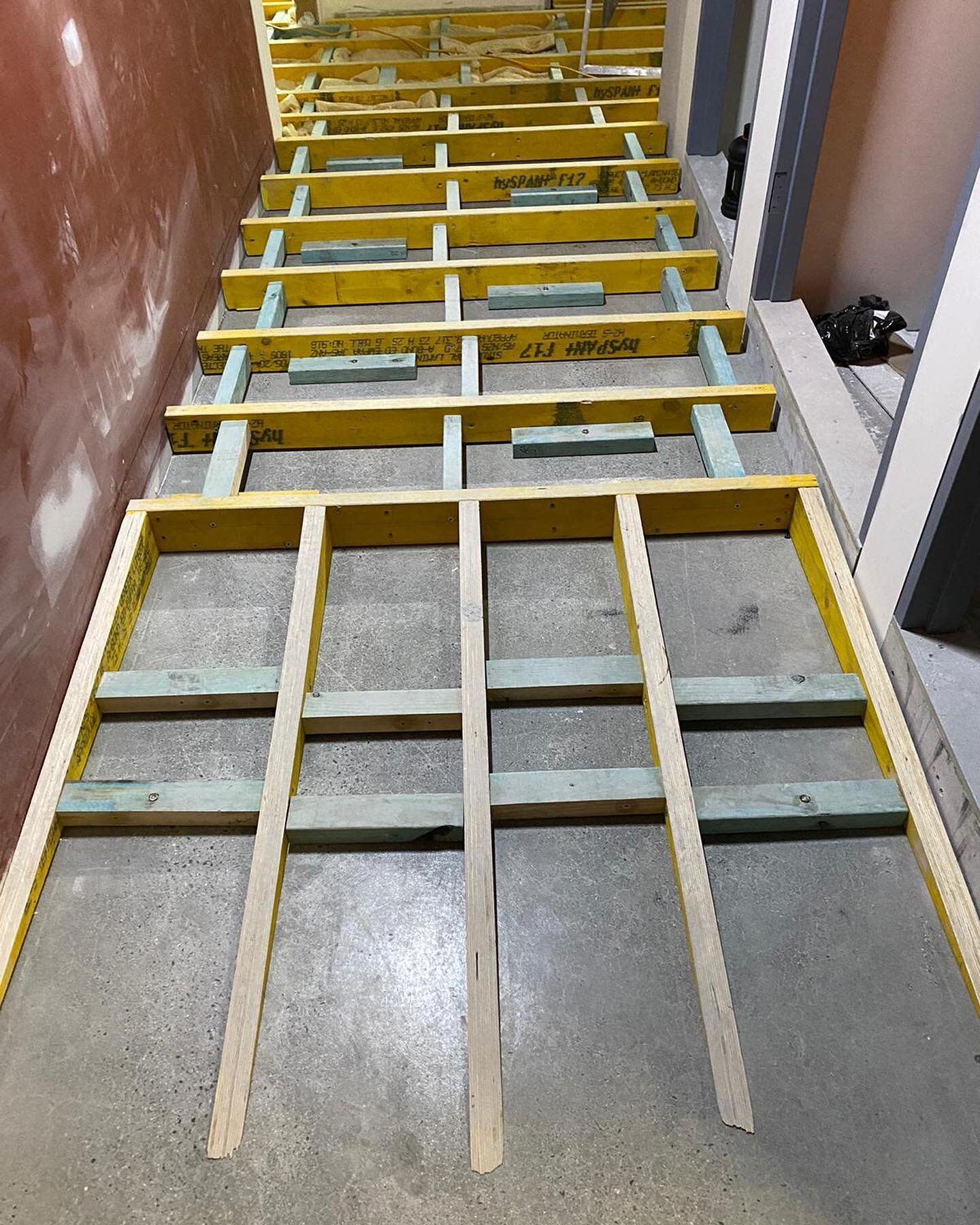 Some pictures of our acoustic flooring system on a commercial site 💯 swipe to see more ▶️

This flooring system consisted of a H2 LVL structural frame (Hyspan F17), which was levelled and fixed to the slab appropriately. After constructing a ramp fo