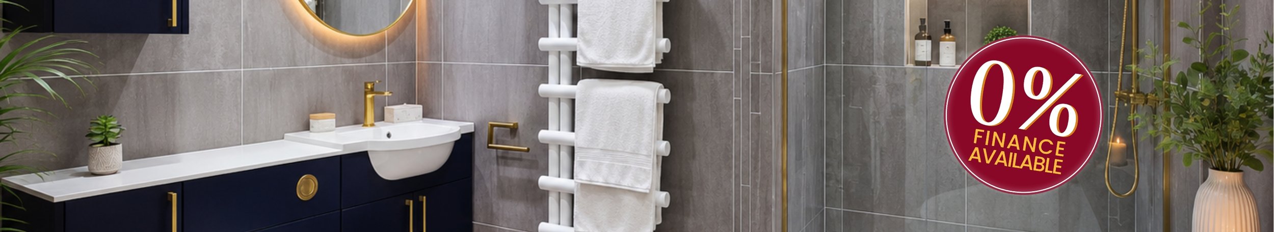 Modern bathroom with gray tiled walls, a white sink with gold fixtures, a navy vanity, potted plants, a towel warmer with white towels, and a circular sign indicating 0% financing available.