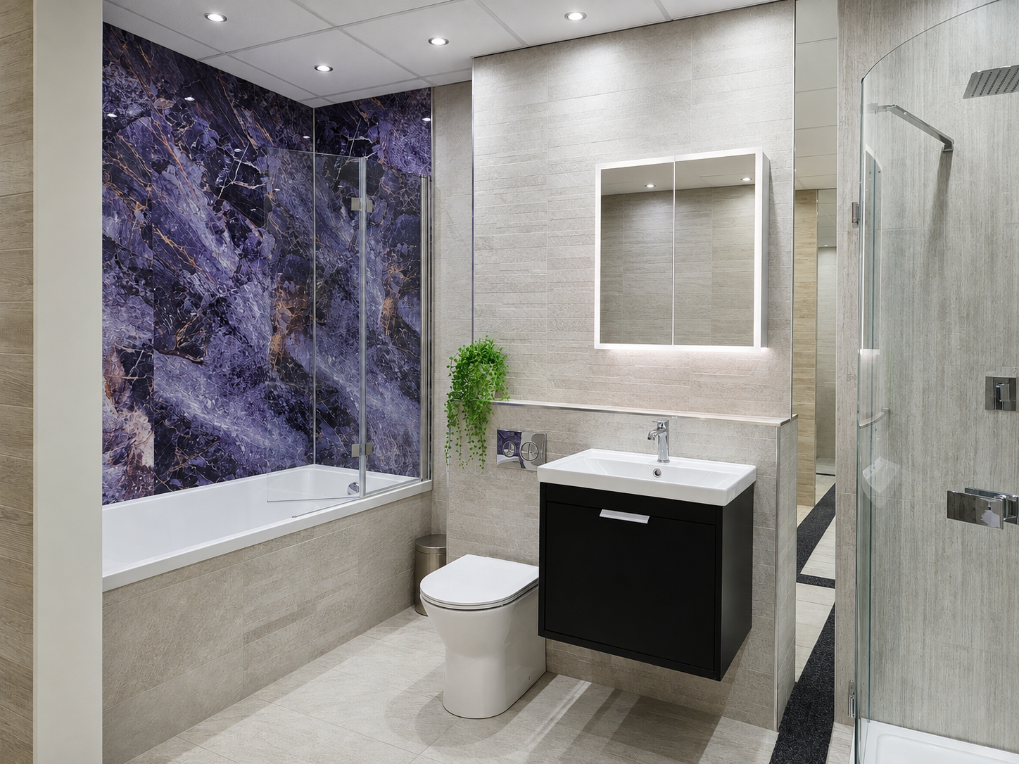 A modern bathroom featuring a purple and black marble bathtub with glass enclosure, beige tiled walls and floor, a white wall-mounted mirror with light, a white sink with a black cabinet, a green potted plant, a small trash bin, and a glass shower do
