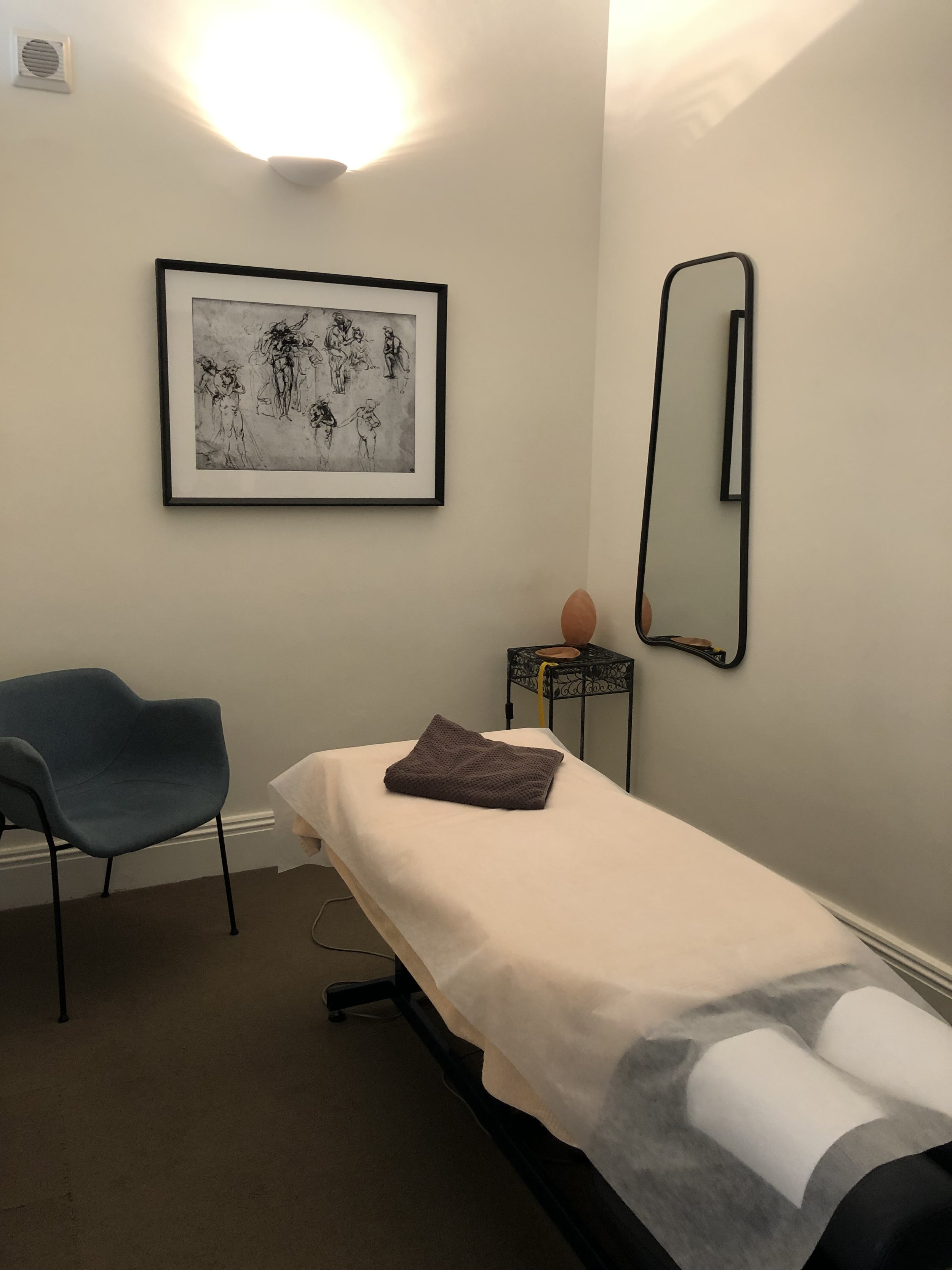 A massage table in one of the treatment rooms at Jowett and Moulton Chiro Melbourne