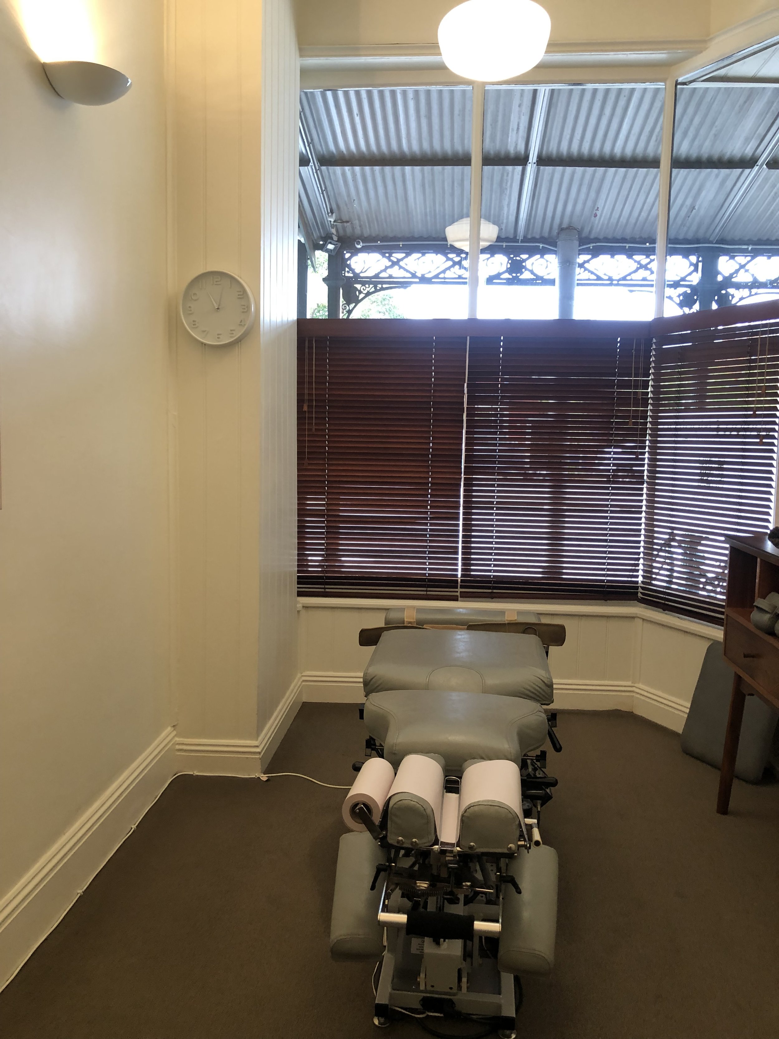 A specialised table used for treating back pain issues at our melb practice