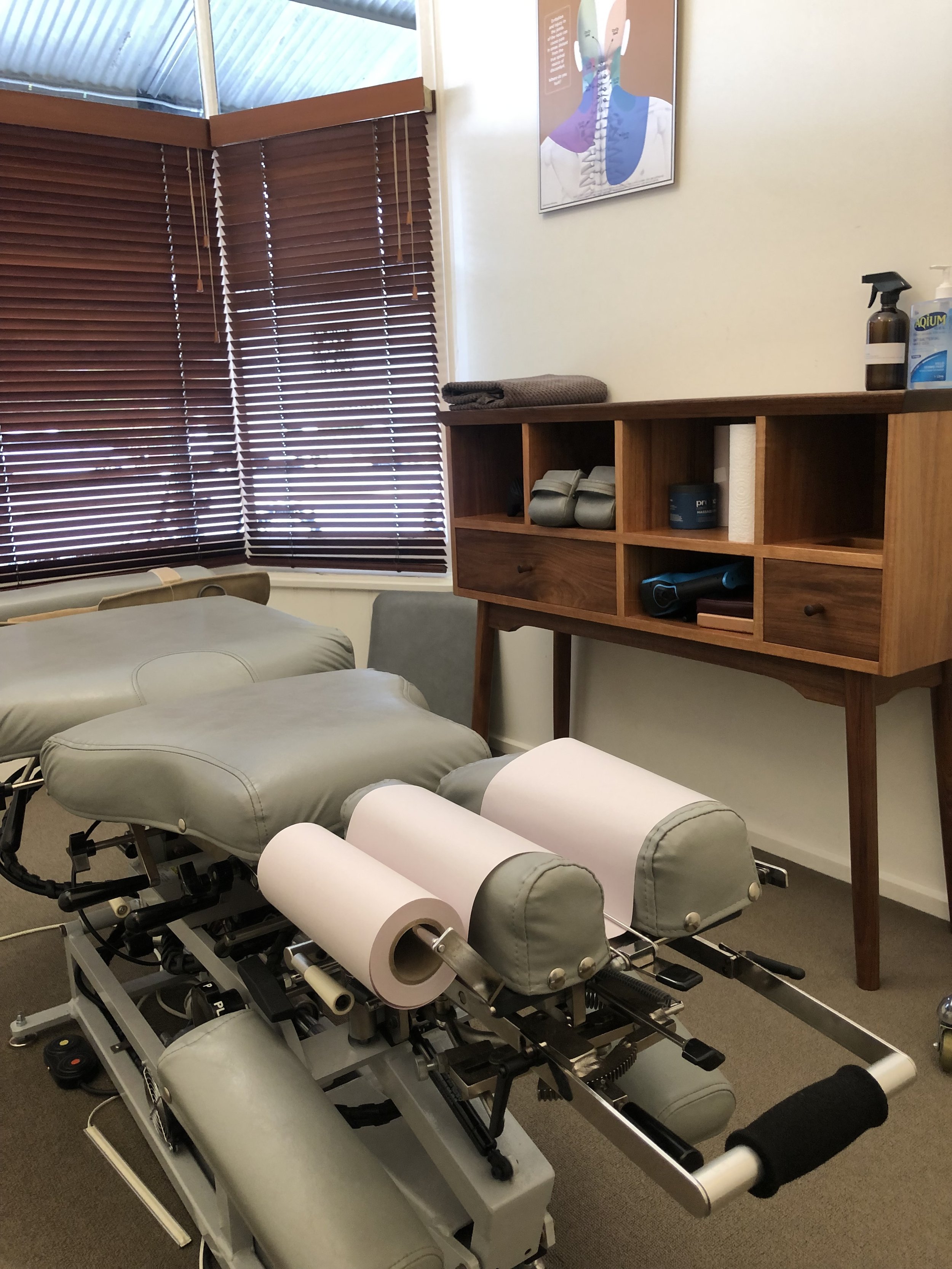 Specialised treatment table used for treating back pain at J&amp;M Chiro Melbourne