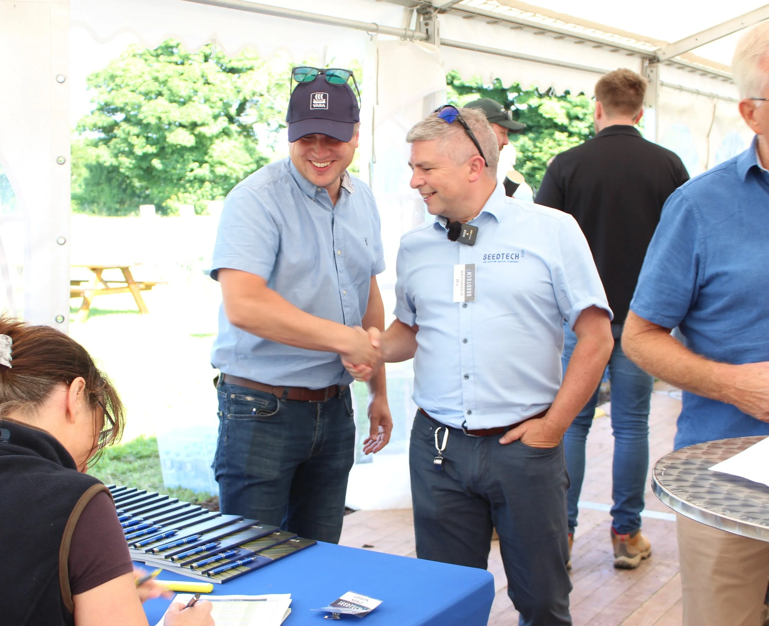 Tim greeting Tim Shiels, Bolgers of Ferns to event.JPG