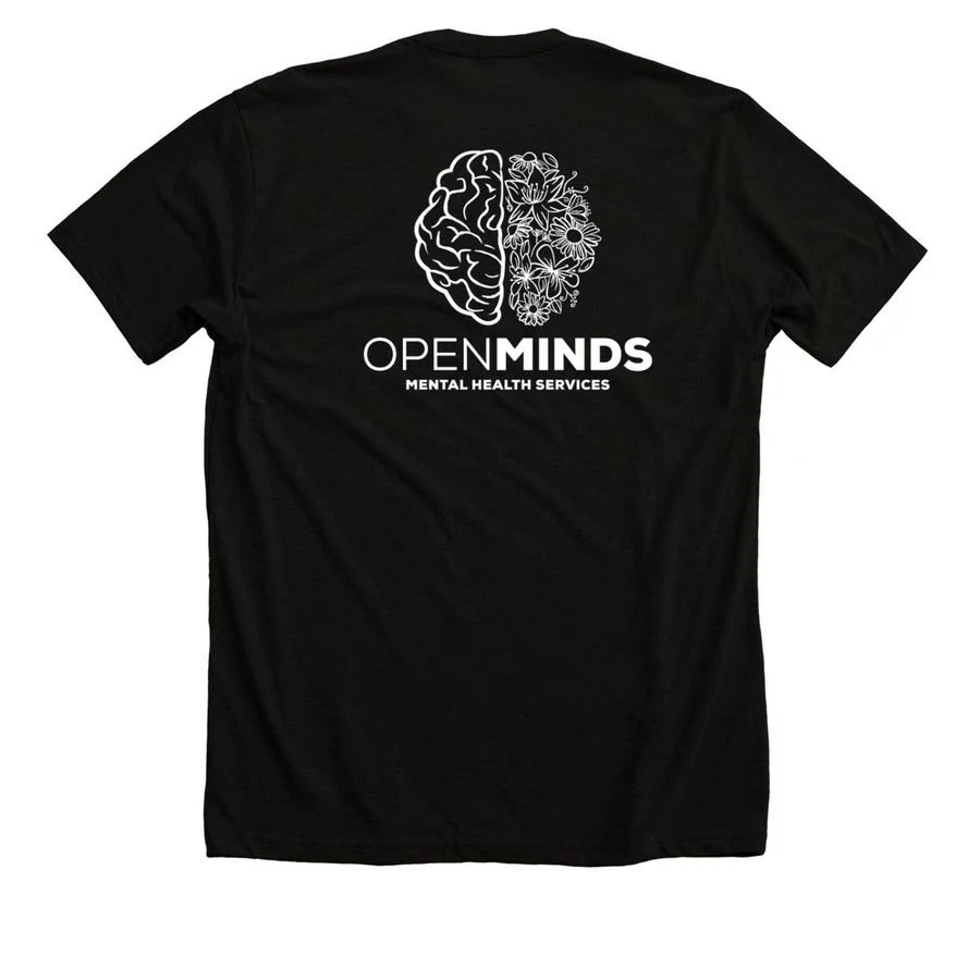 Black T-shirt with white graphic of a brain and flowers, text reads "Open Minds Mental Health Services".