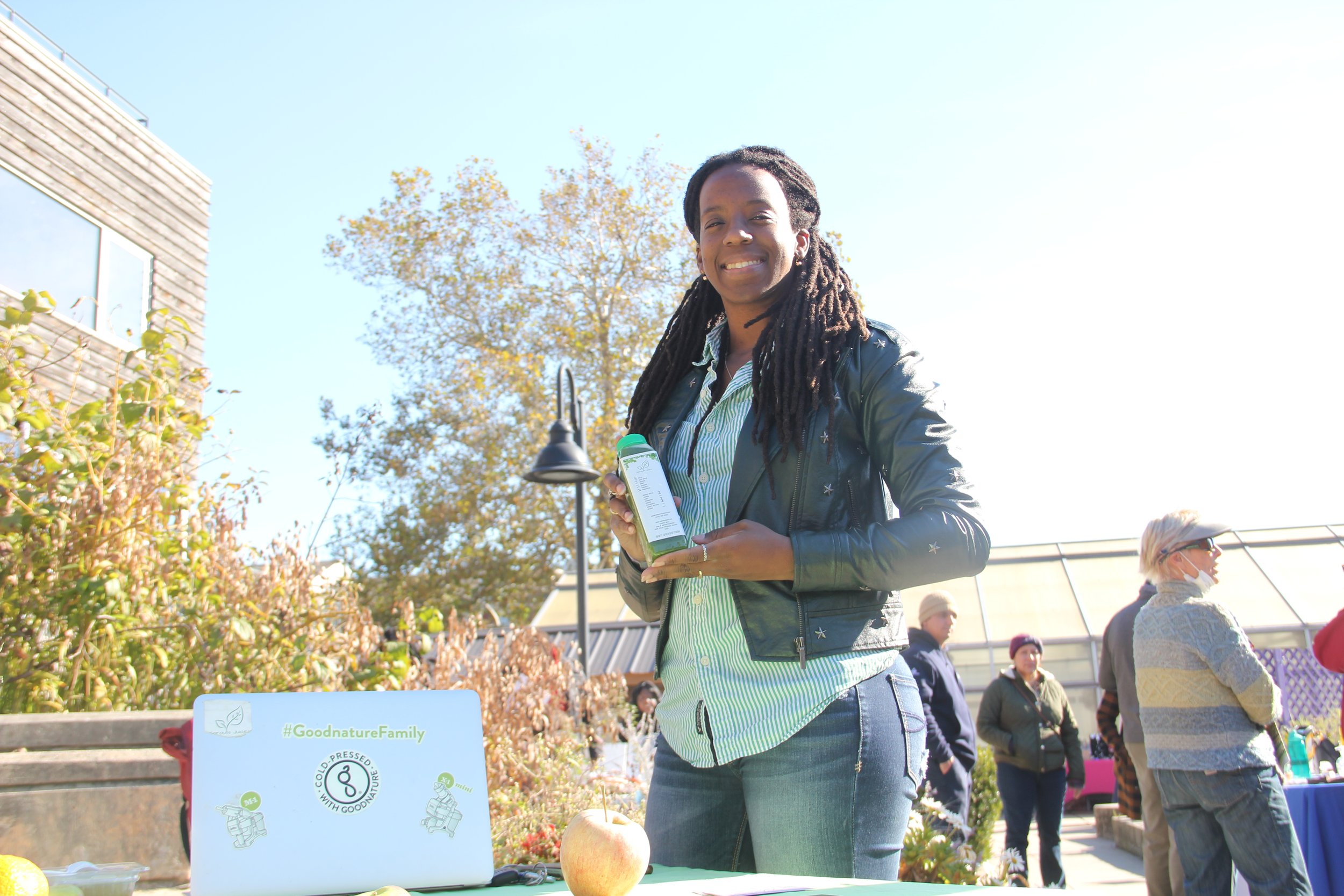 Courtney Adalah, owner of Sprouts Juice displaying one of her products, Newark, NJ, Nov. 6