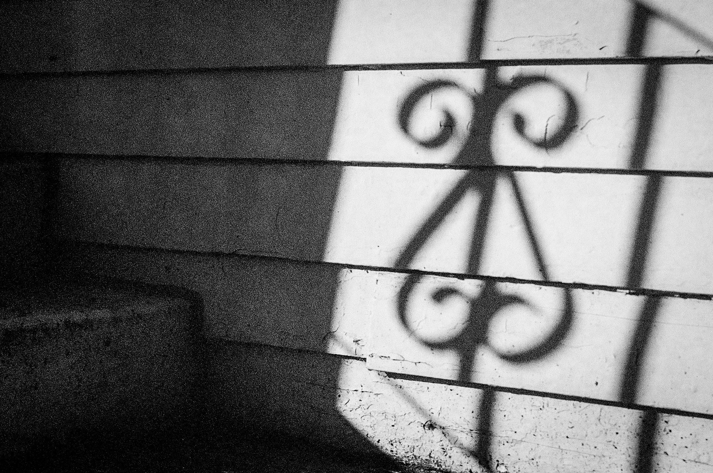 Railing_shadow_seattle_Fremont_35mm_BW.png