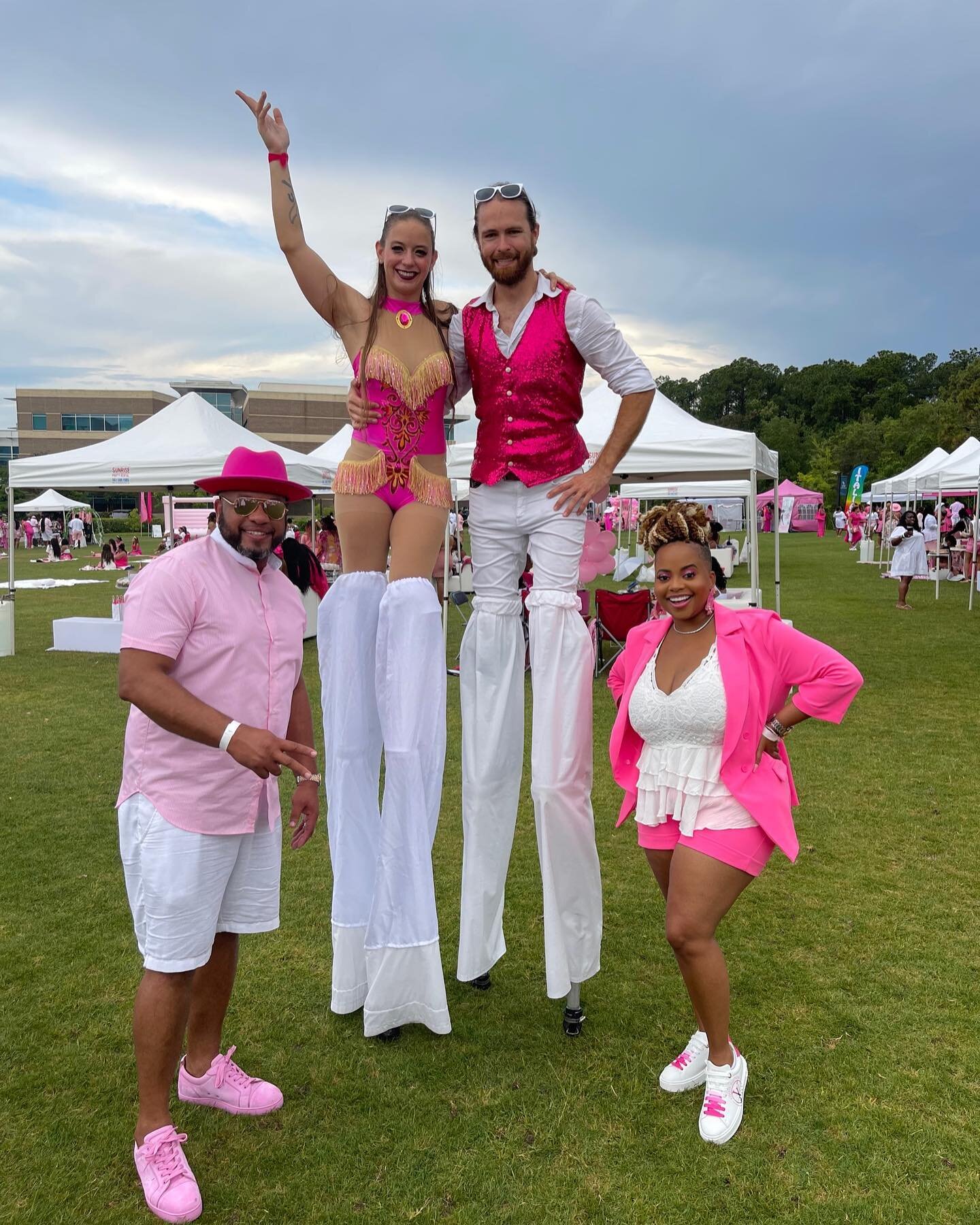 #champicnic2022  #champicnicjax pics from this fun event glad @kristen_sparrow_circus could be a part of it ! Rain or shine it was a blast #ilikepink #dancing on stilts! #circus #cantstopwontstop #stilts #stiltwalker #circuseverydamnday #booknow #eve