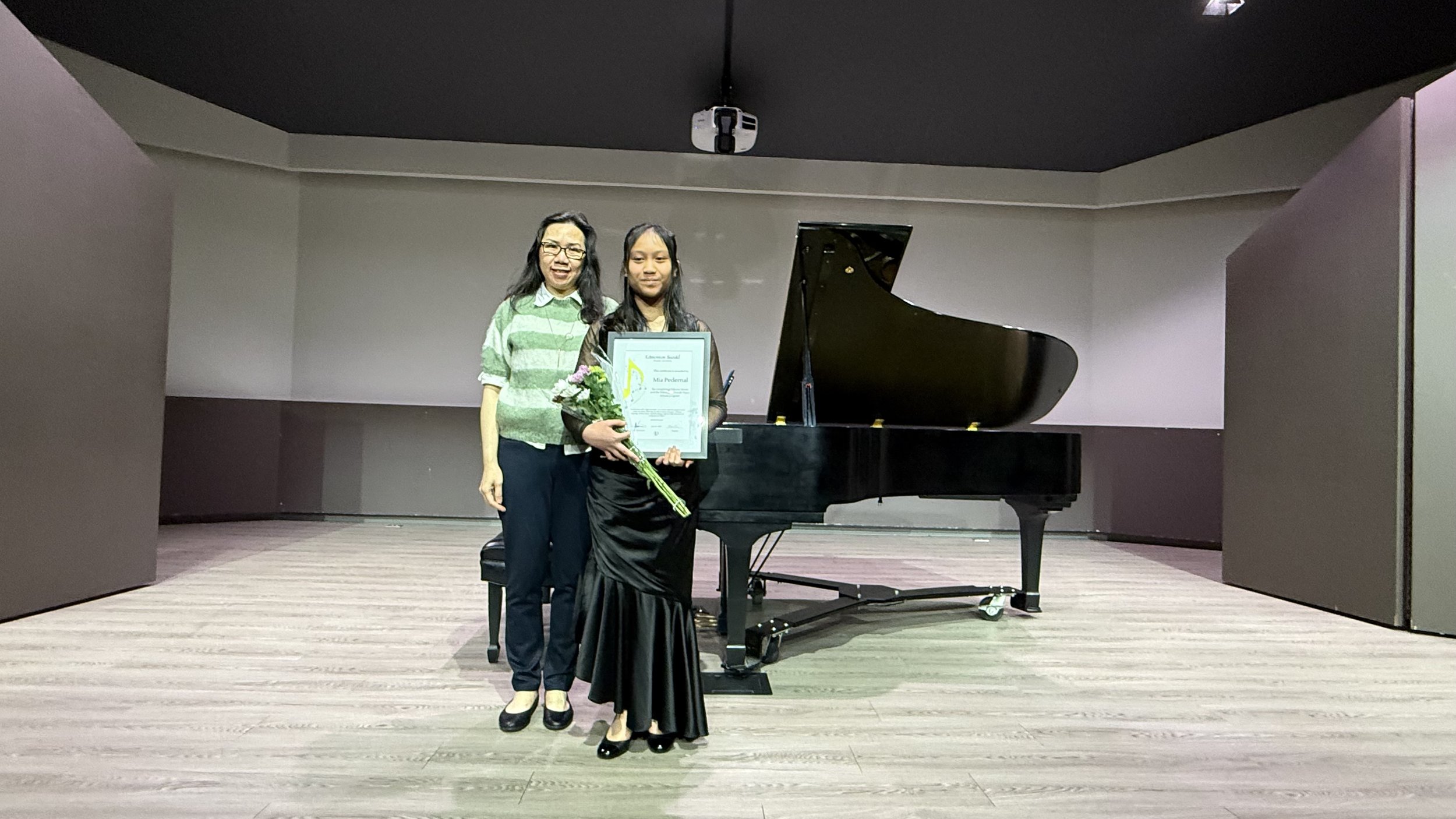 Mia with her ESPS teacher, Eleanor Tsui