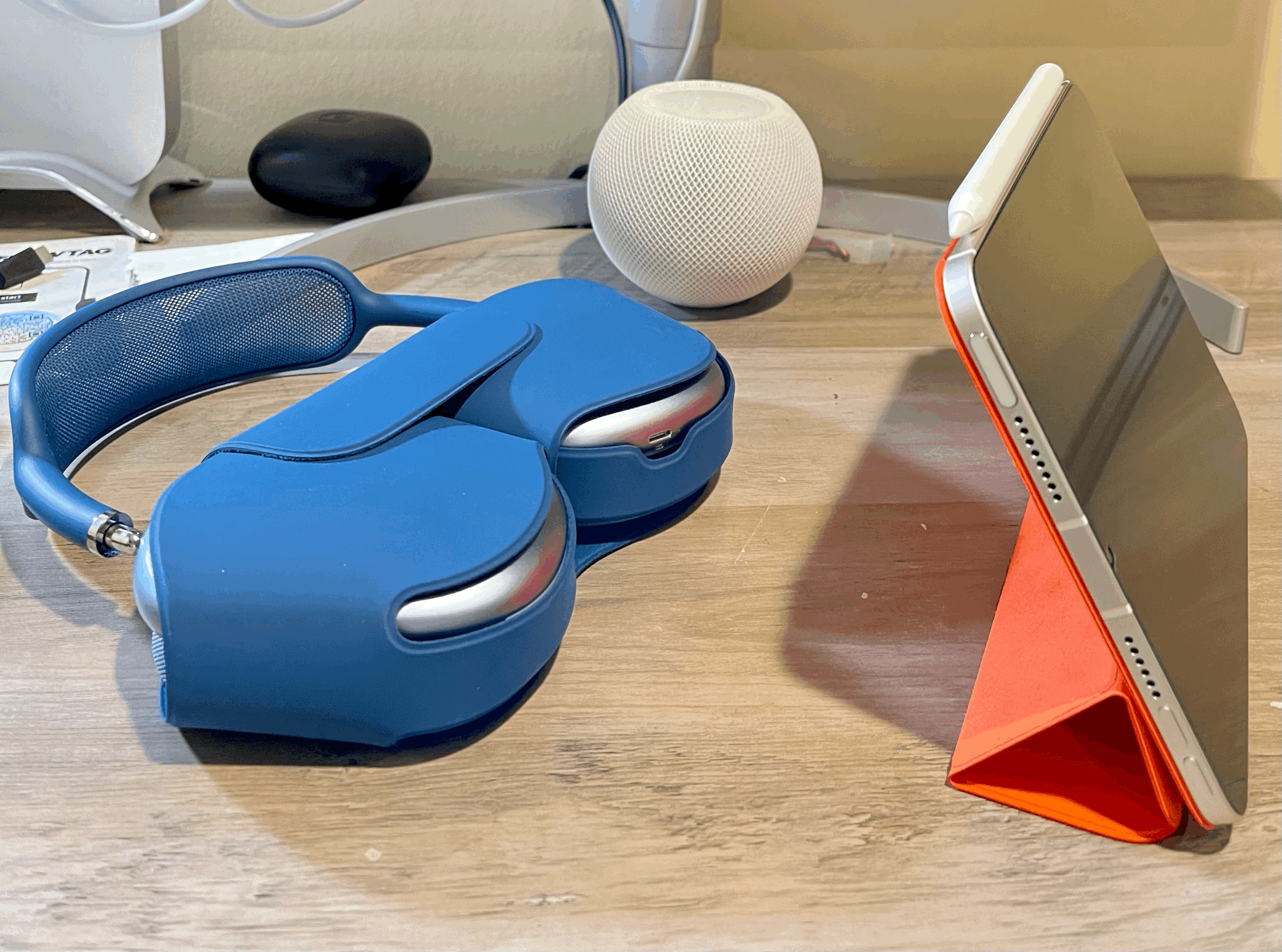 iPad mini 6 beside AirPods Max and HomePod mini