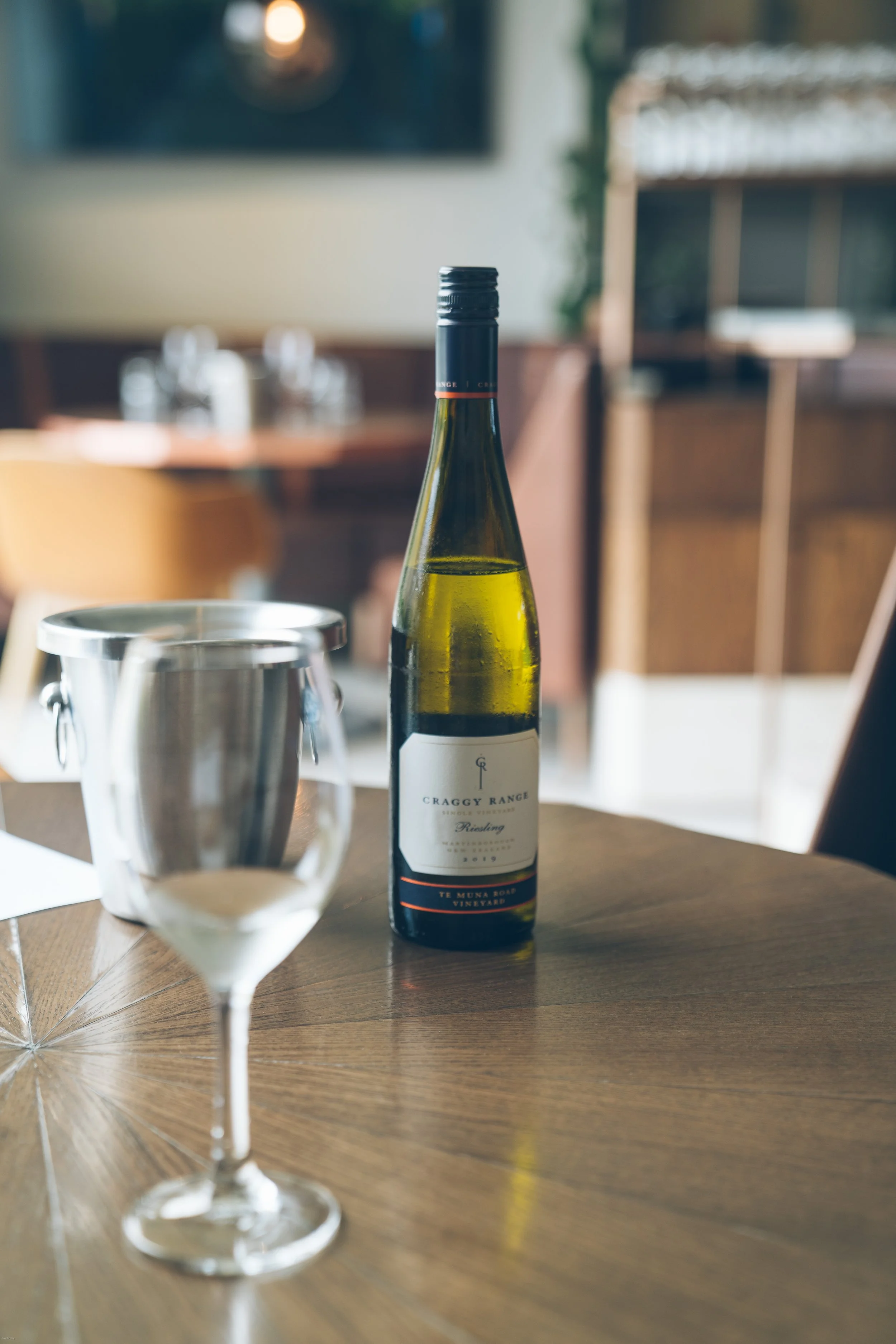 Bottle of Craggy Range Riesling during a wine tasting at the renowned Craggy Range Winery near Havelock North in Hawke’s Bay, one of New Zealand’s premier wine regions.