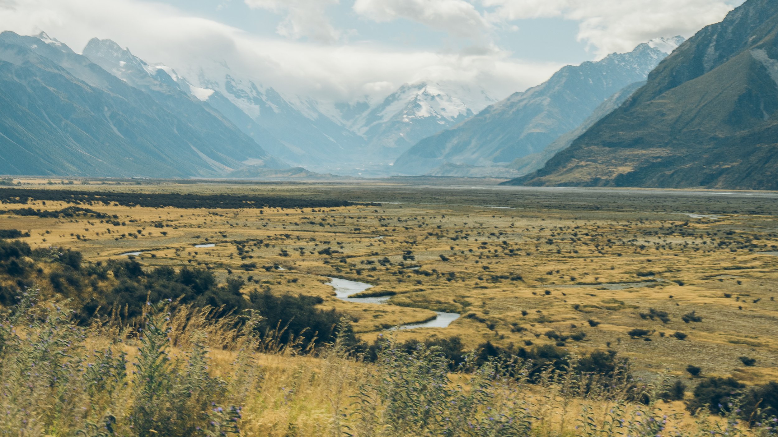 First view of Aoraki / Mount Cook rising above the glacial valley in Aoraki / Mount Cook National Park, one of New Zealand's most breathtaking alpine landscapes on the South Island.