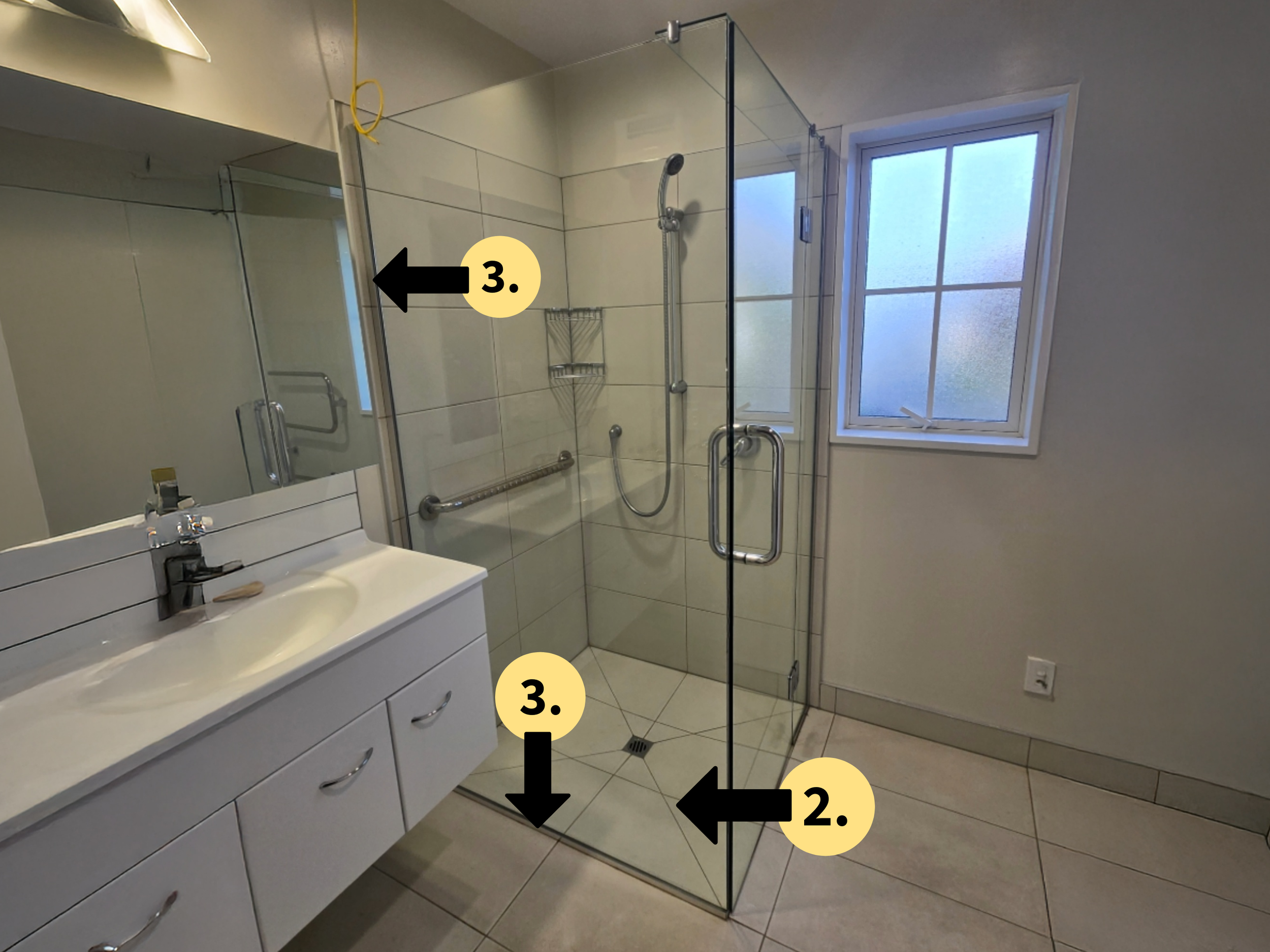 Custom frameless shower with separate glass panels and open entry layout