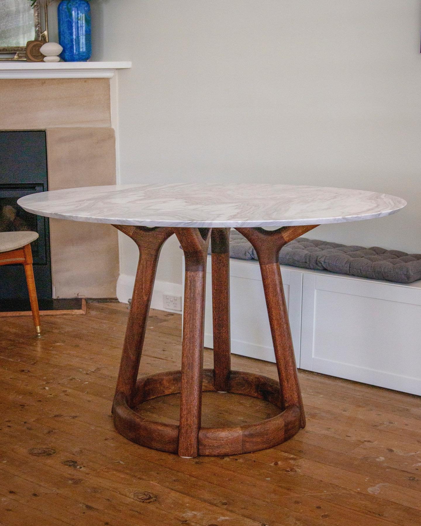 The Newport round dining table base - with a stunning marble top! A great collaboration with the client on this one to arrive at a dream dining table! 

Beautiful and practical joinery, plenty of legroom with the return angle on the base and space in