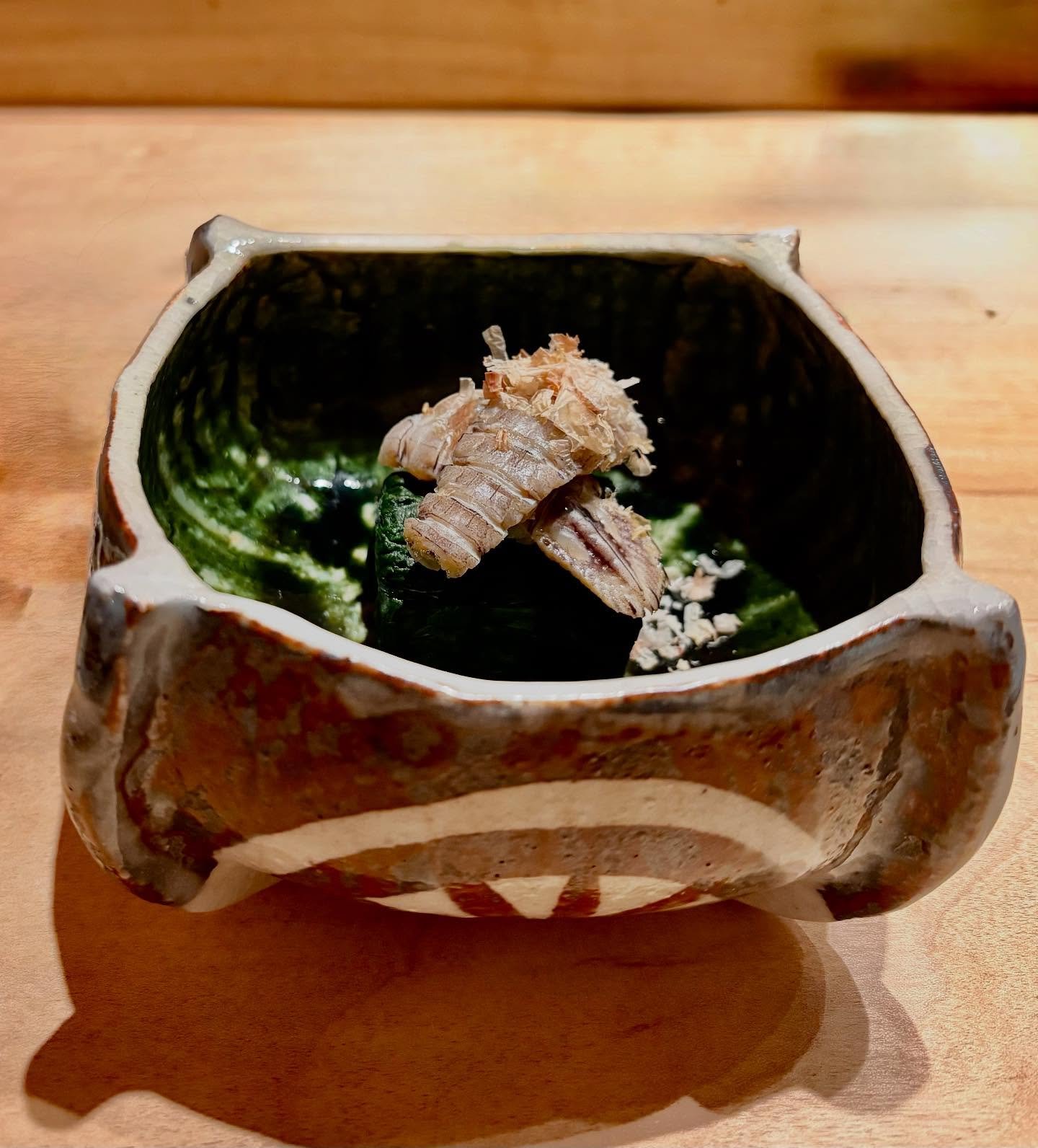 Shako - Mantis Shrimp. Our preparation: gently boiled in a flavorful broth, infused with a touch of soy sauce, mirin, and dashi to enhance their natural sweetness and umami. This tenderizes the meaty texture while preserving its delicate flavor. Inst