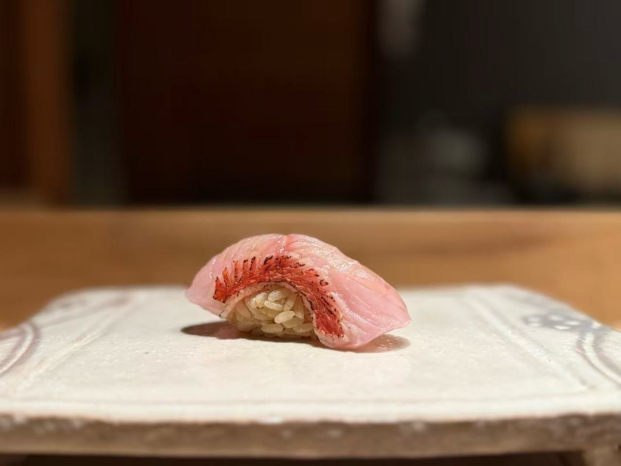 Tancho Omakase: Golden eye snapper, lightly torched on the skin.
Beautifully made into nigiri, with the gentle torch bringing out a deeper aroma and richer flavor while keeping the fish elegant, delicate, and refined.

#TanchoOmakase #CastroValleyEat