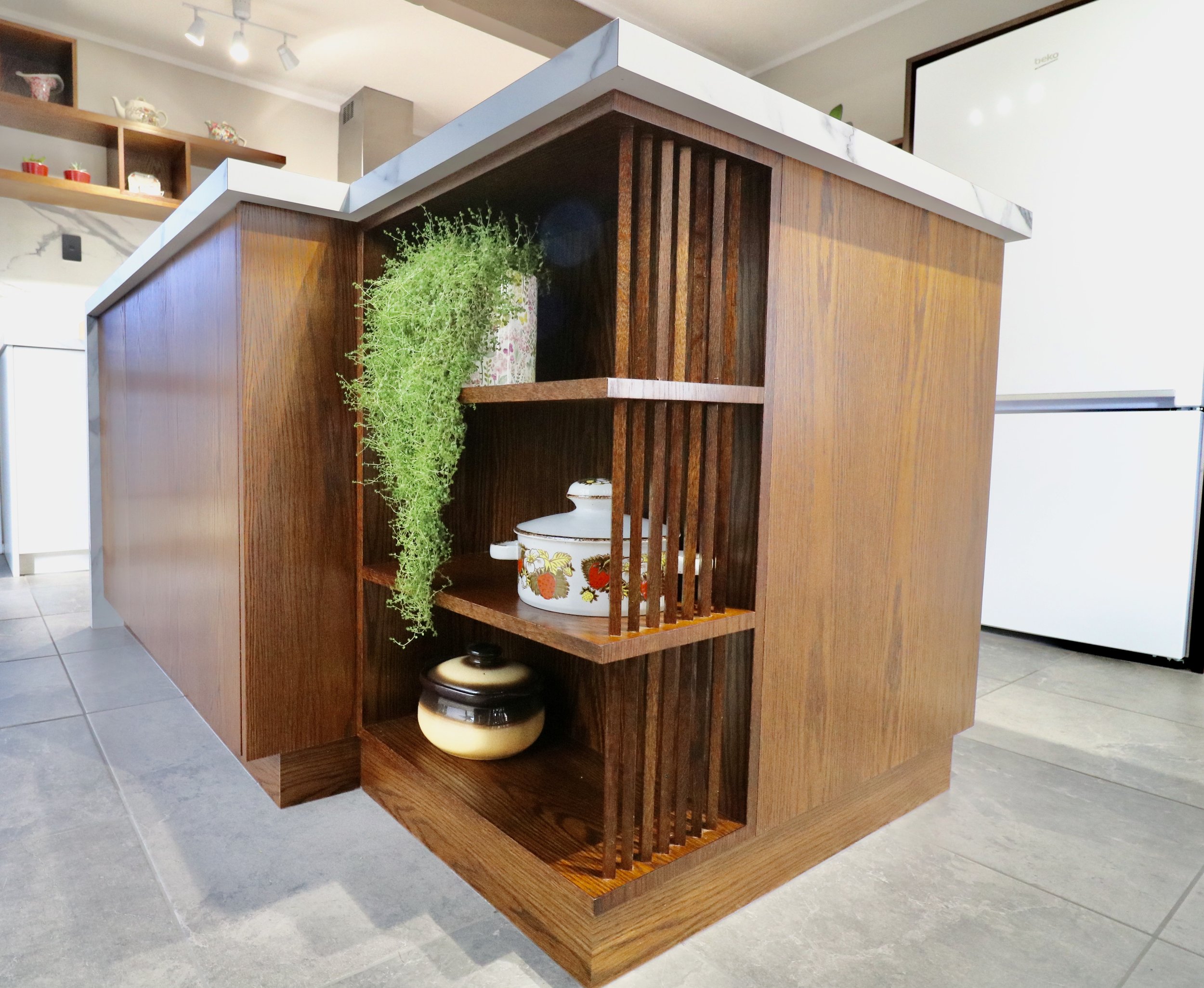*The detail of the island -with an open shelf and cupboards with push to open doors gives a beautiful finish