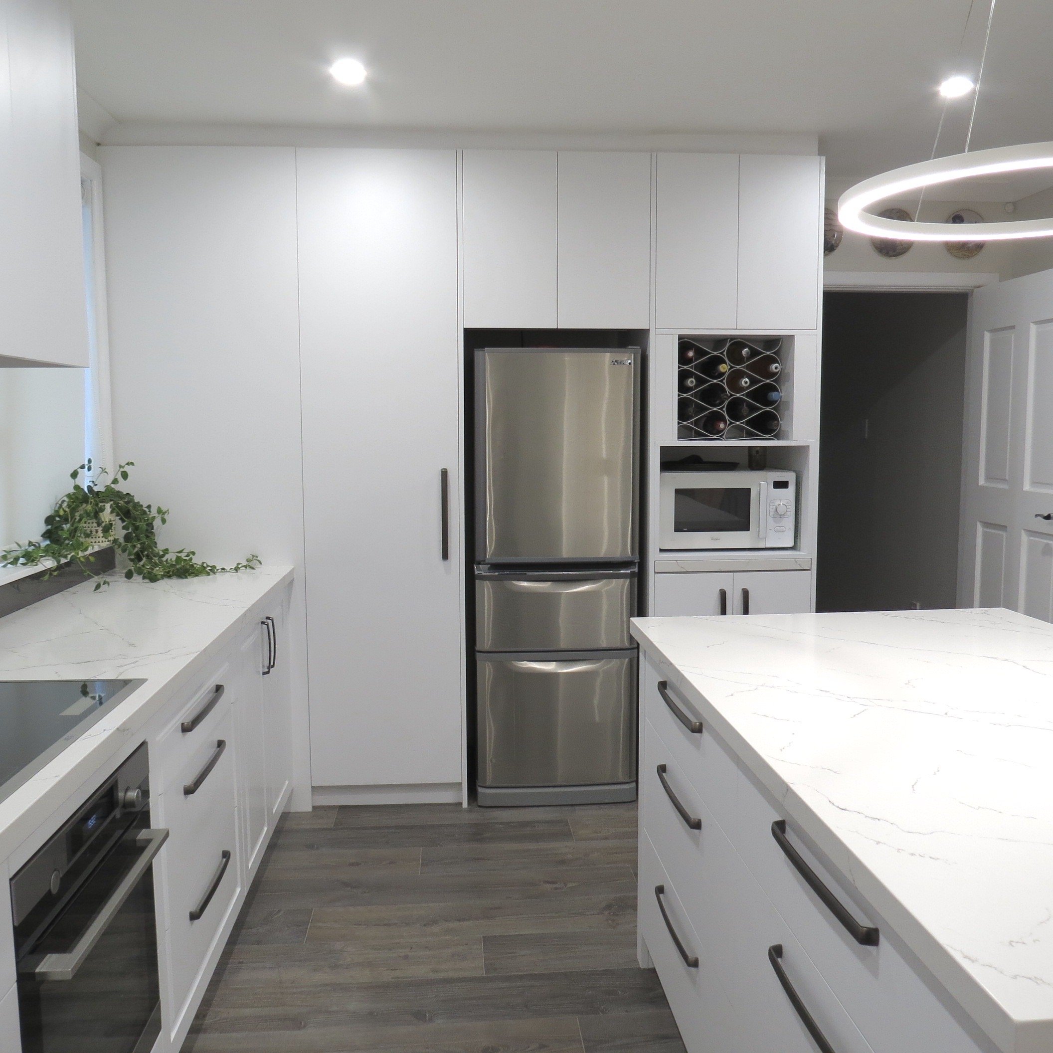 *Cabinets going to the ceiling with a negative detail around the top
*Featuring Echelon wine rack supplied by Fit